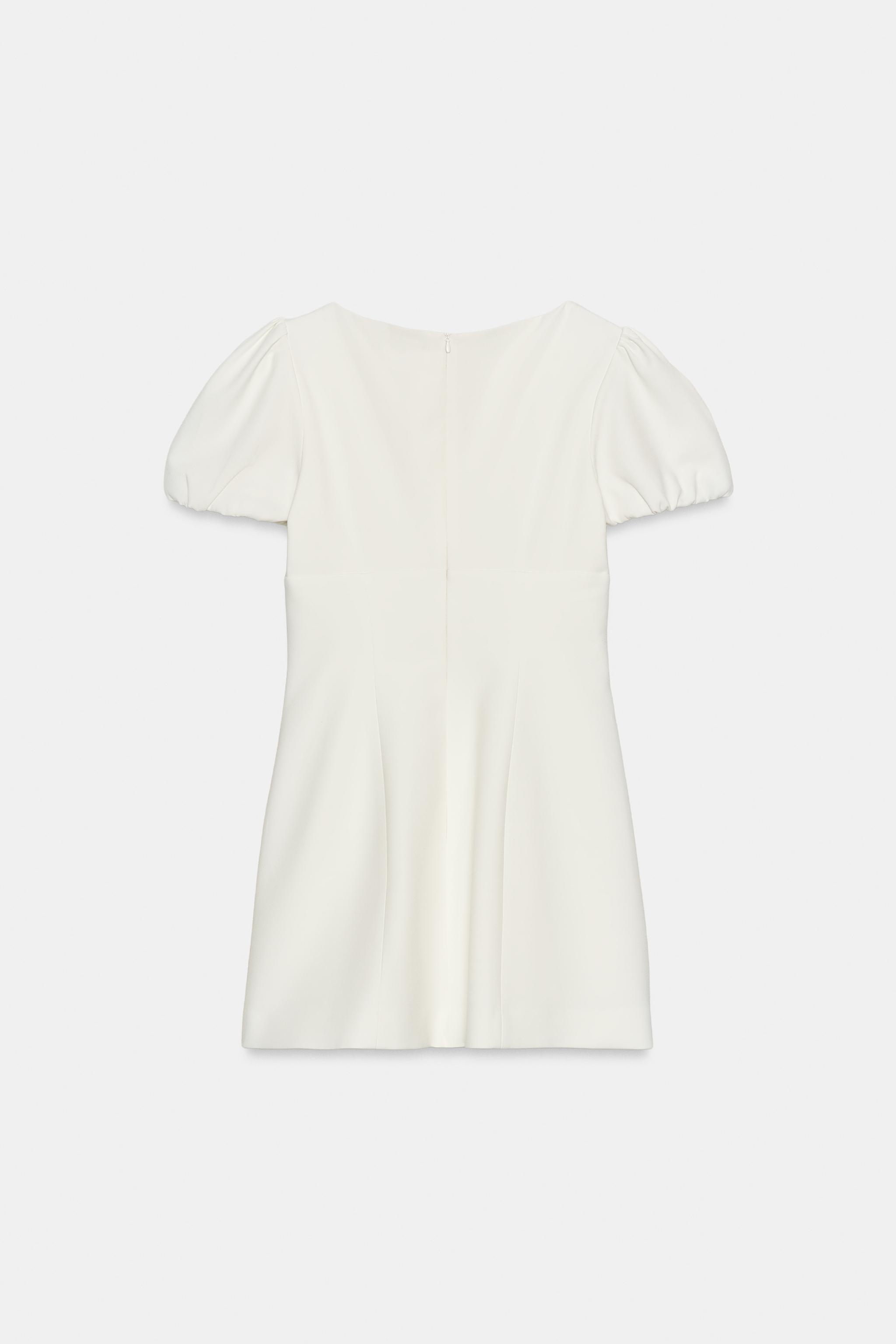 ROBE COURTE PLIS POCHES