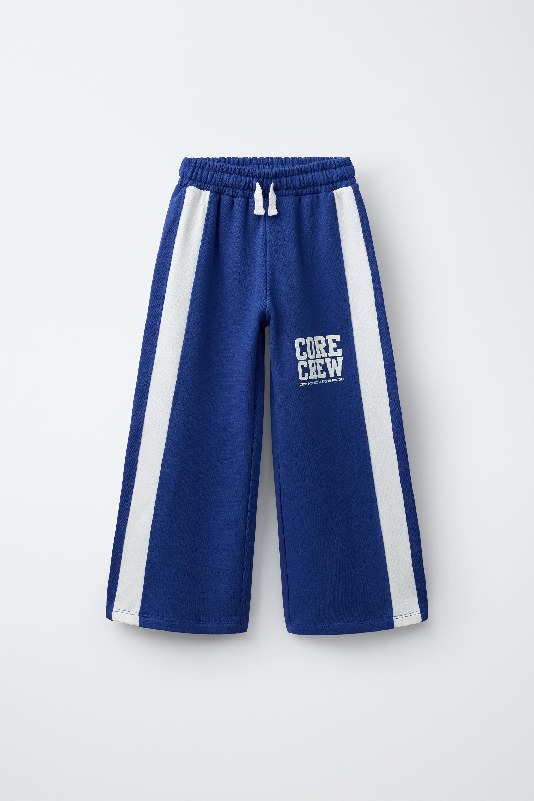 WIDE LEG PANTS WITH SIDE STRIPES