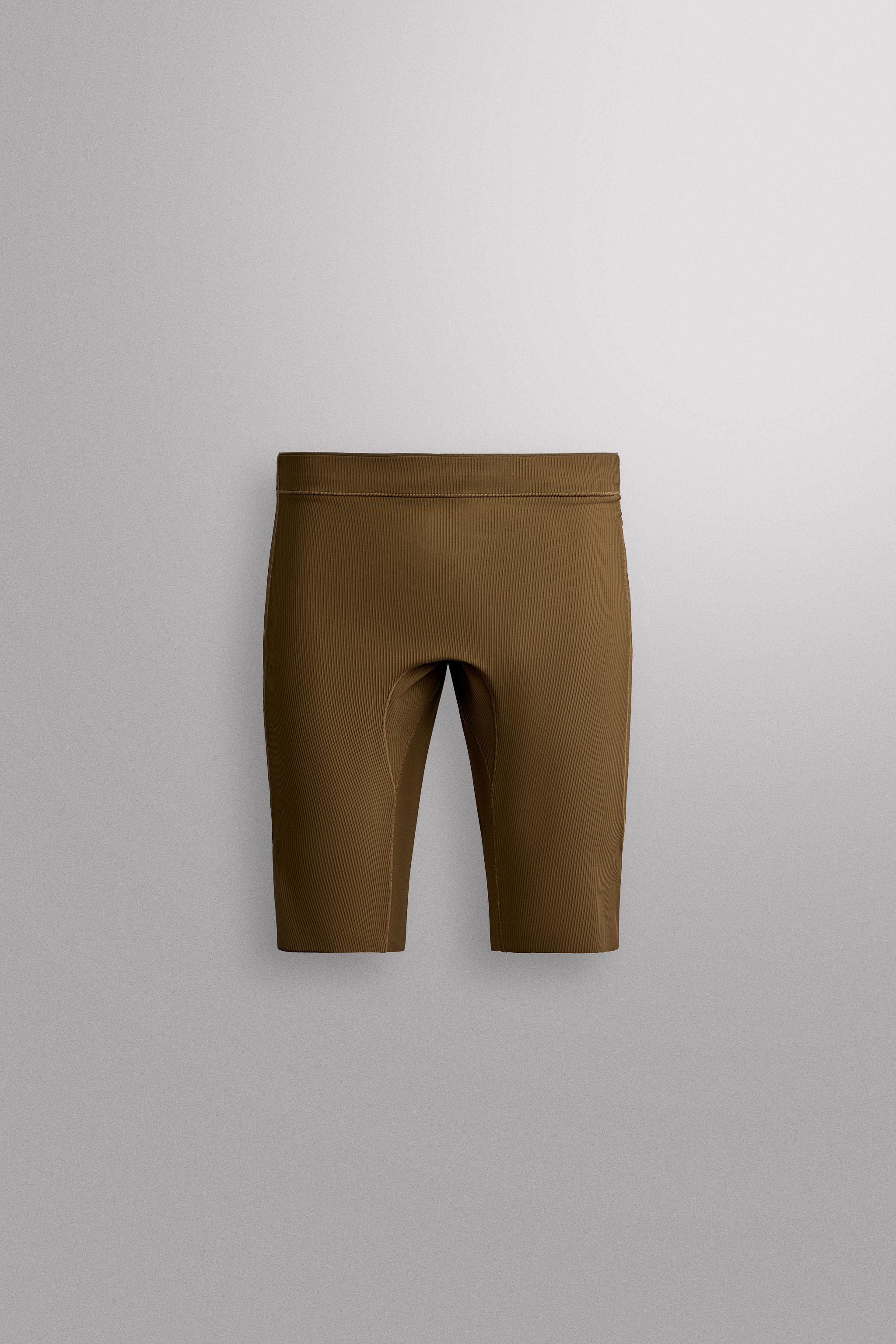 RUNNING SHORTS — Mid-green