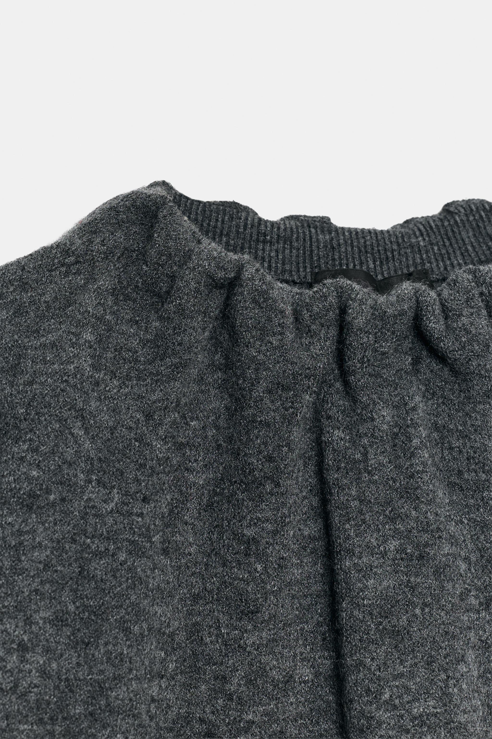 PULL EN MAILLE À COL PLIS