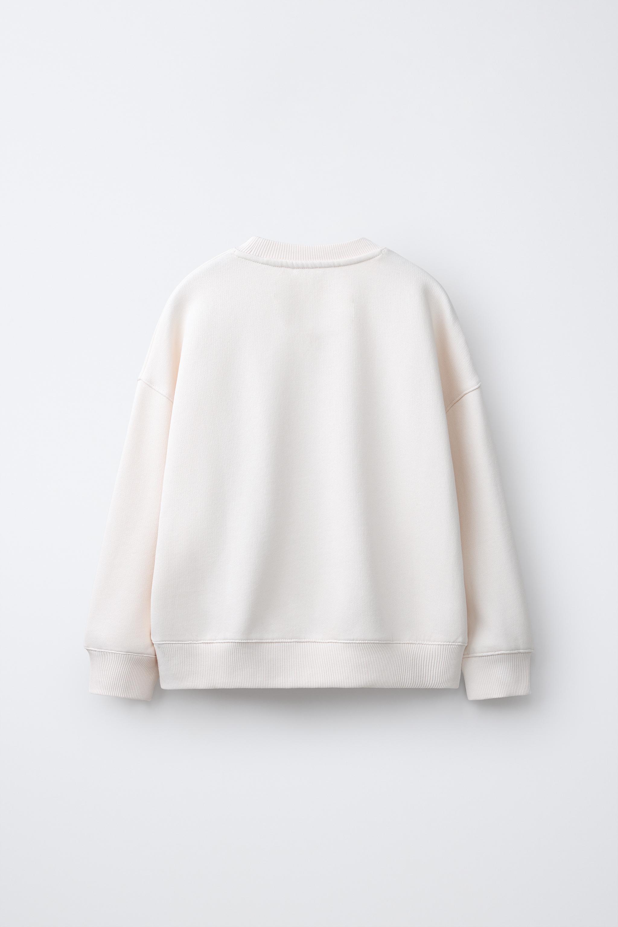 DRAWSTRING FLOWER SWEATSHIRT