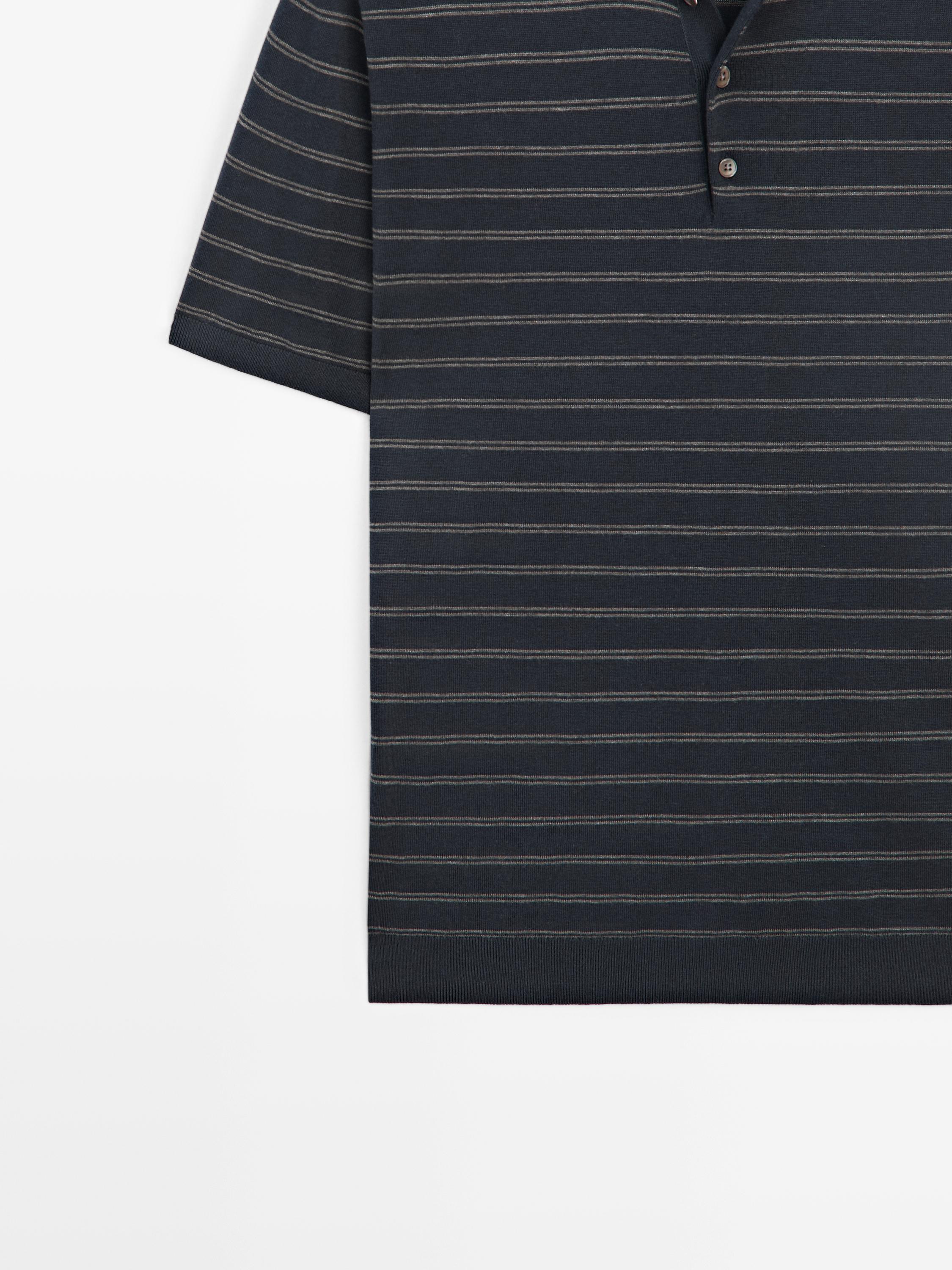 Cotton blend knit polo shirt with striped detail