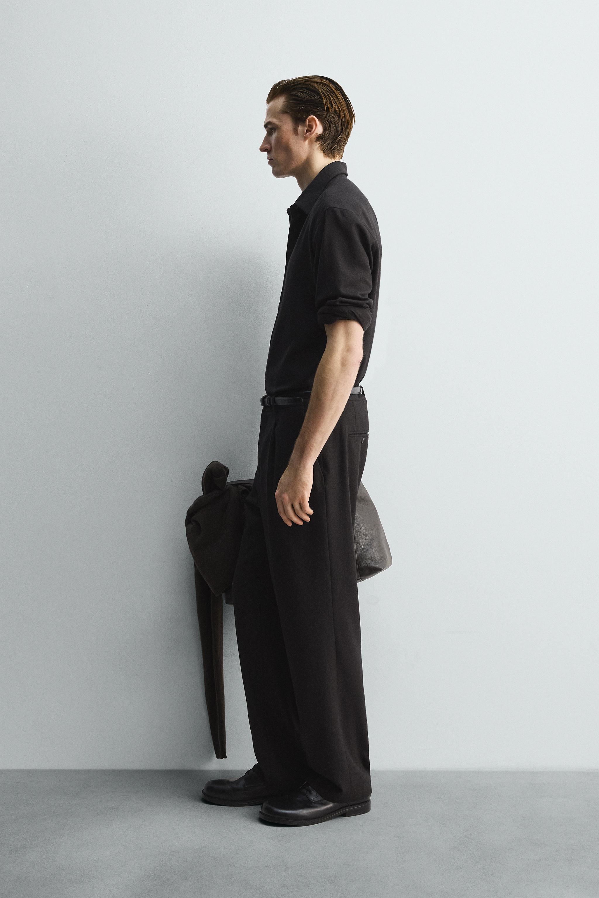 LIMITED EDITION PLEATED WOOL PANTS