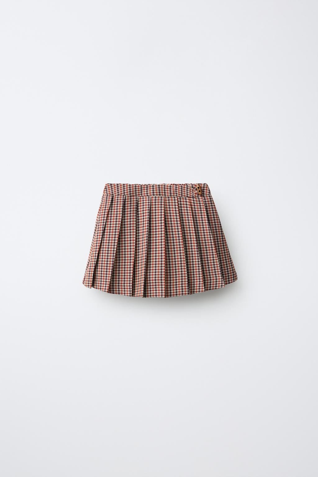 CHECK PLEATED SKORT WITH FROG FASTENING