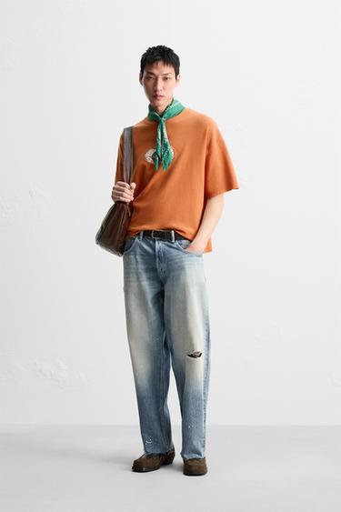 RIPPED BAGGY FIT JEANS - Light blue by Zara