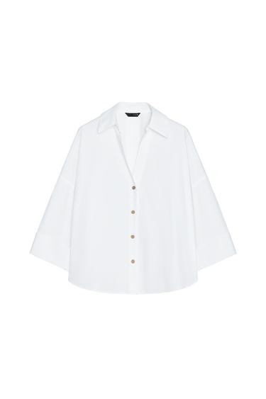 Front view of a white shirt with button-down front and wide sleeves.