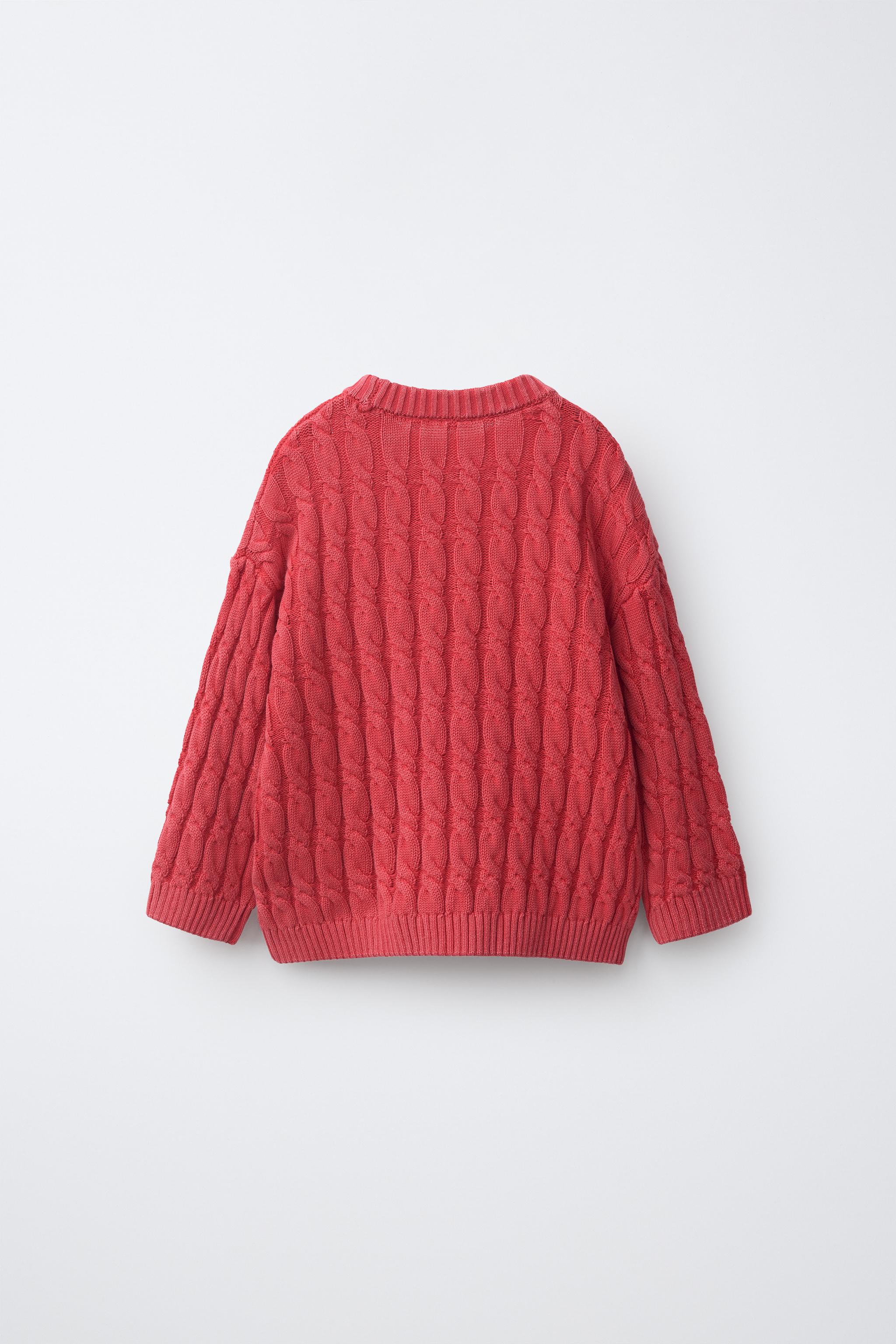 PULL EN MAILLE À TORSADES ET ÉTIQUETTE FRUIT OF THE LOOM™