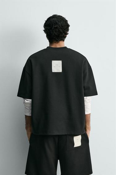 T-SHIRT WITH LABEL PATCH - Black by Zara