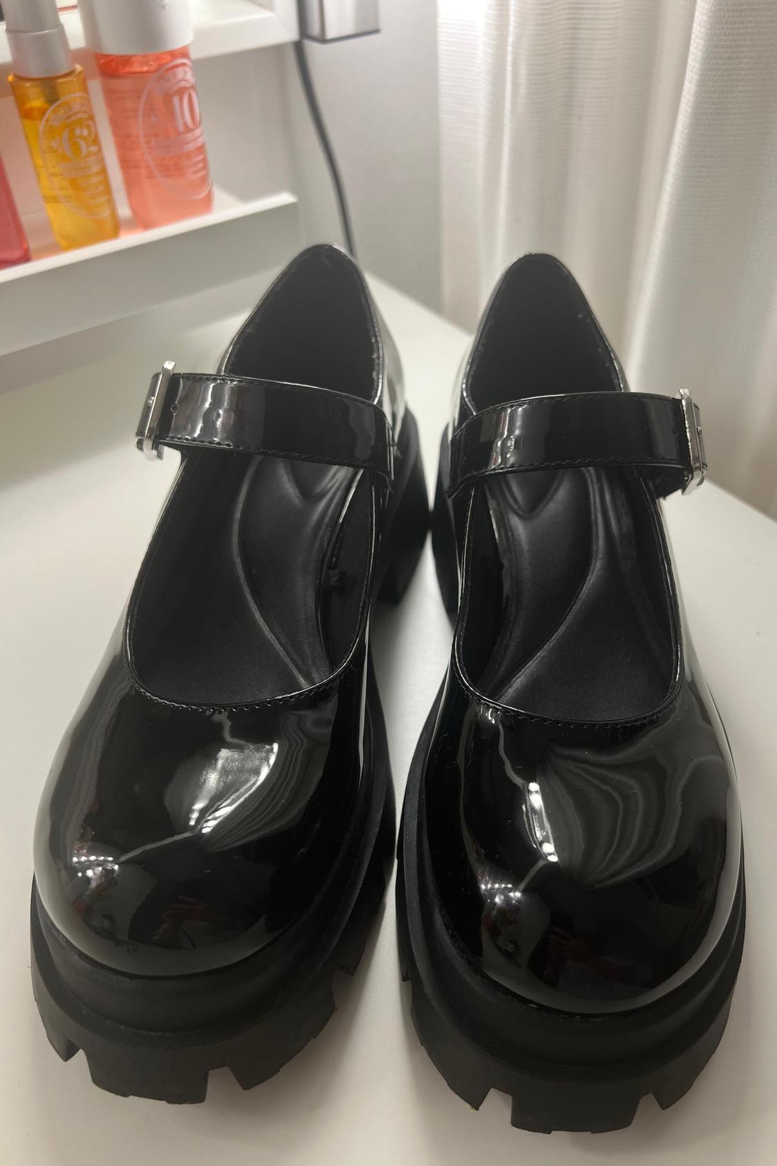 TRACK-SOLE MARY JANES WITH BUCKLE