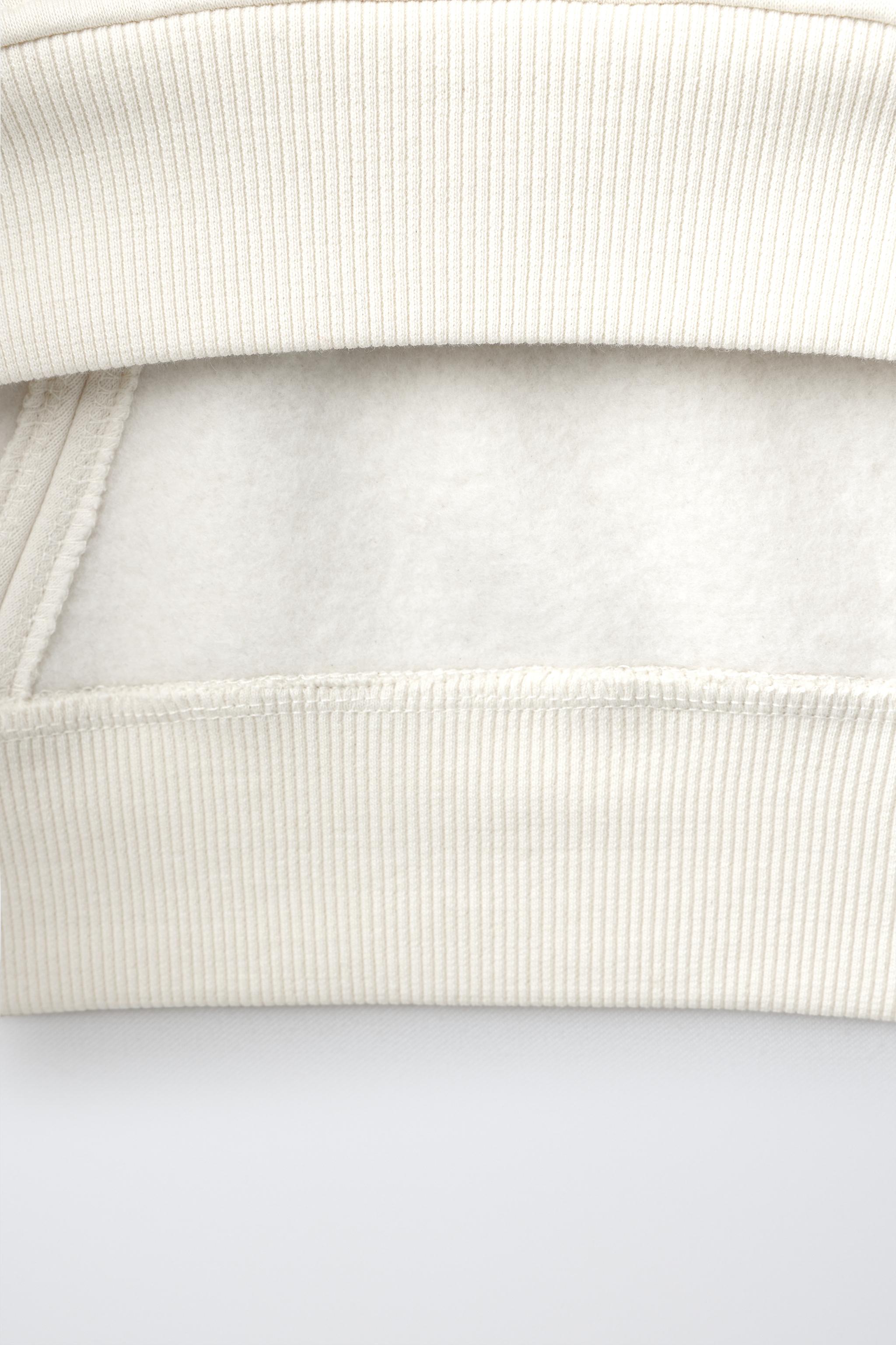 FLOCK BOW SWEATSHIRT