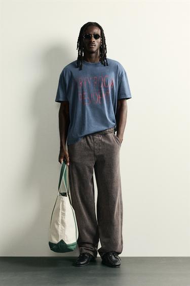 CAMISETA TEXTO EFECTO LAVADO - Azul de Zara - Imagen 0
