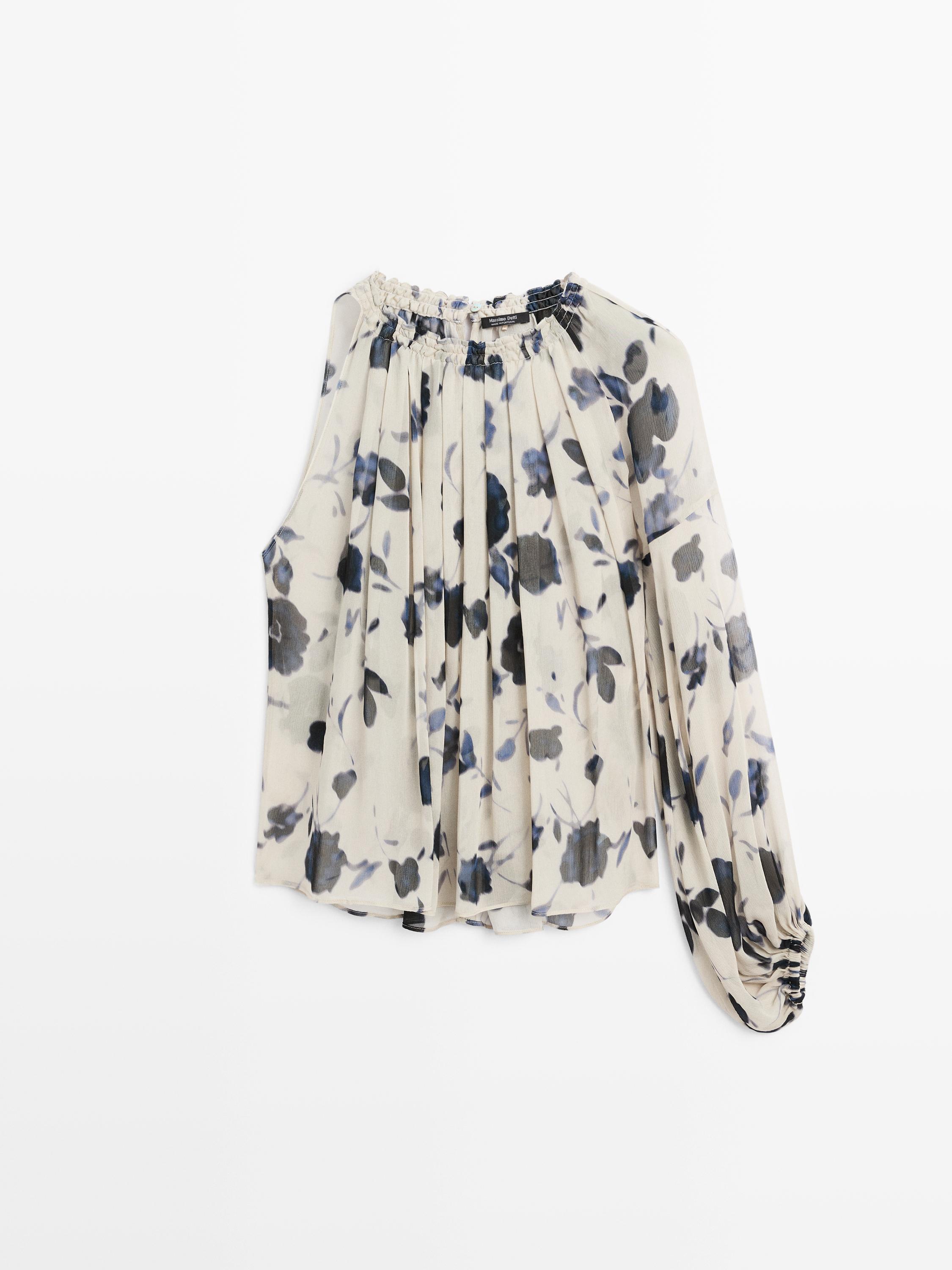 Asymmetric flowing floral print blouse