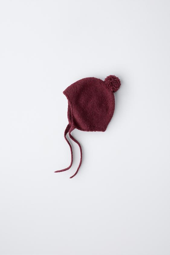 KNIT BONNET WITH POMPOM