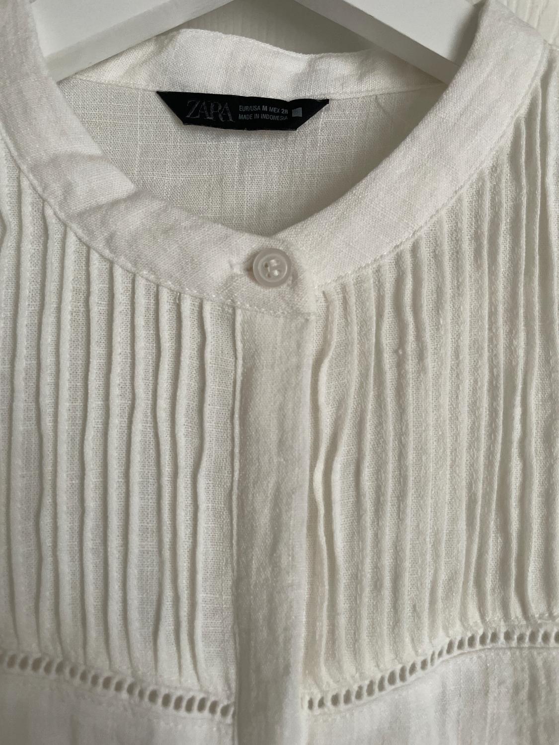 BLUSA VOLANTES ENTREDOSES - Image 3