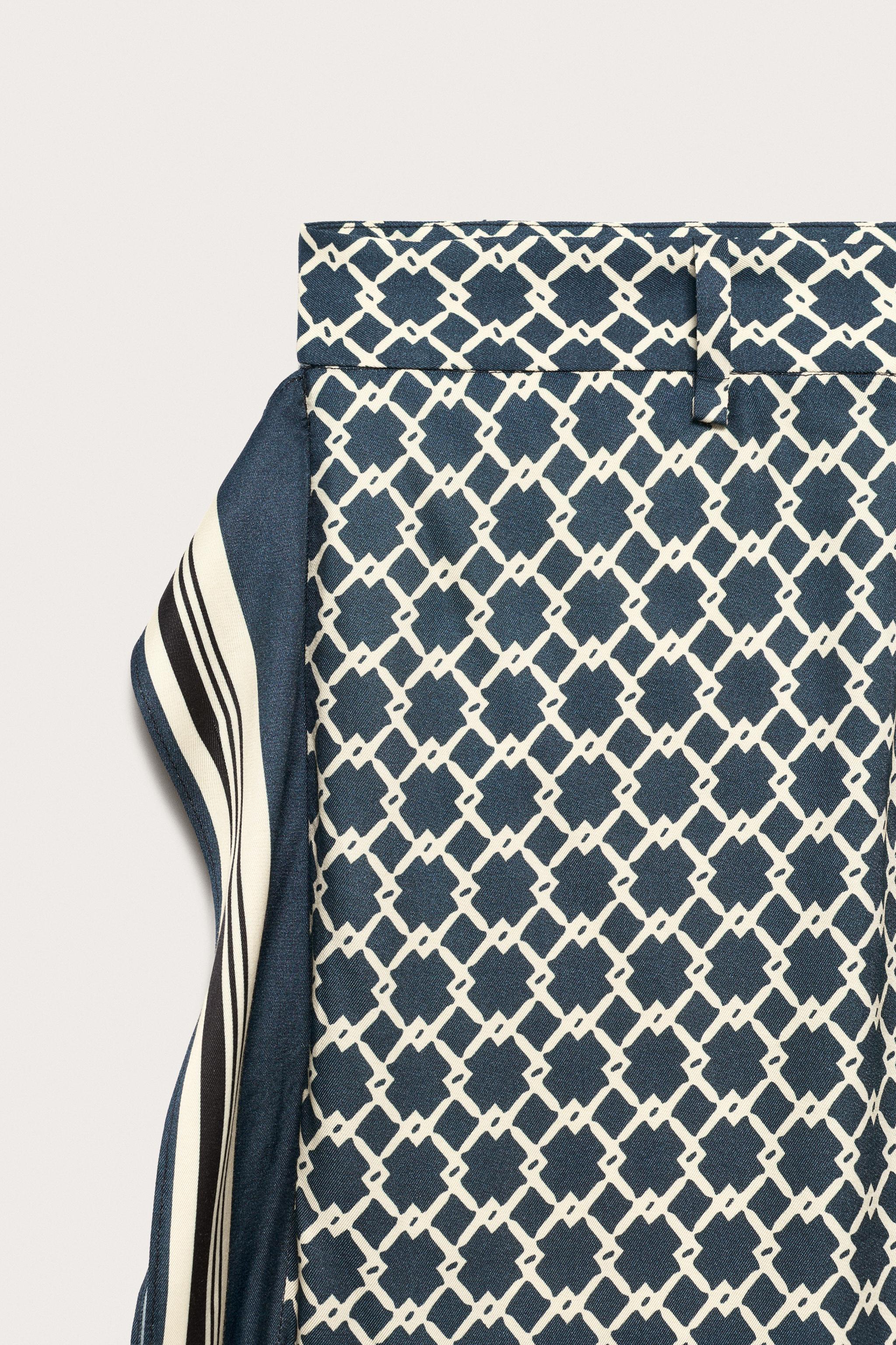 LIMITED EDITION FLOWY PANTS WITH SIDE BANDS