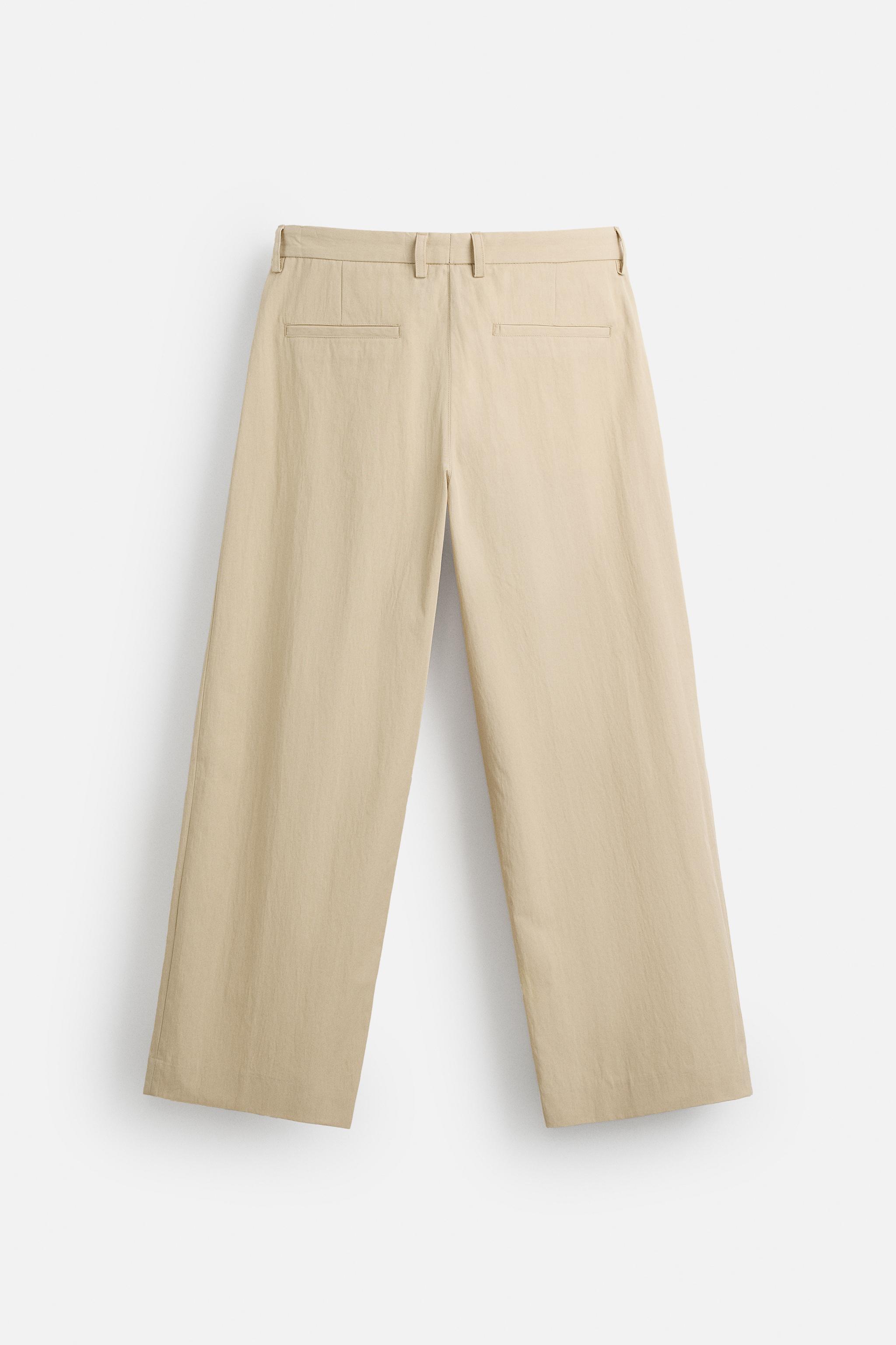 LIMITED EDITION RELAXED FIT PLEATED PANTS - taupe brown