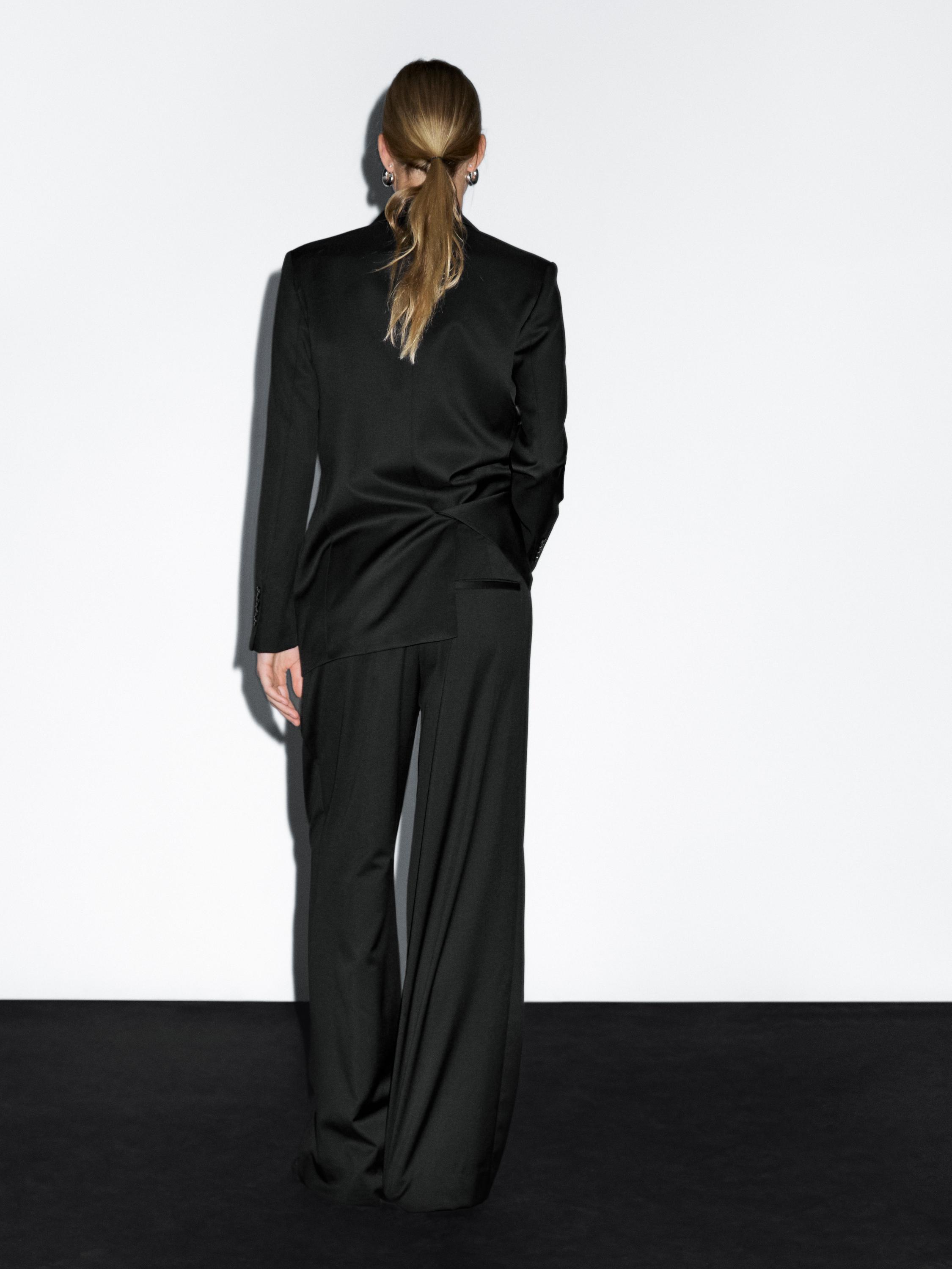 100% extra fine wool pleated trousers