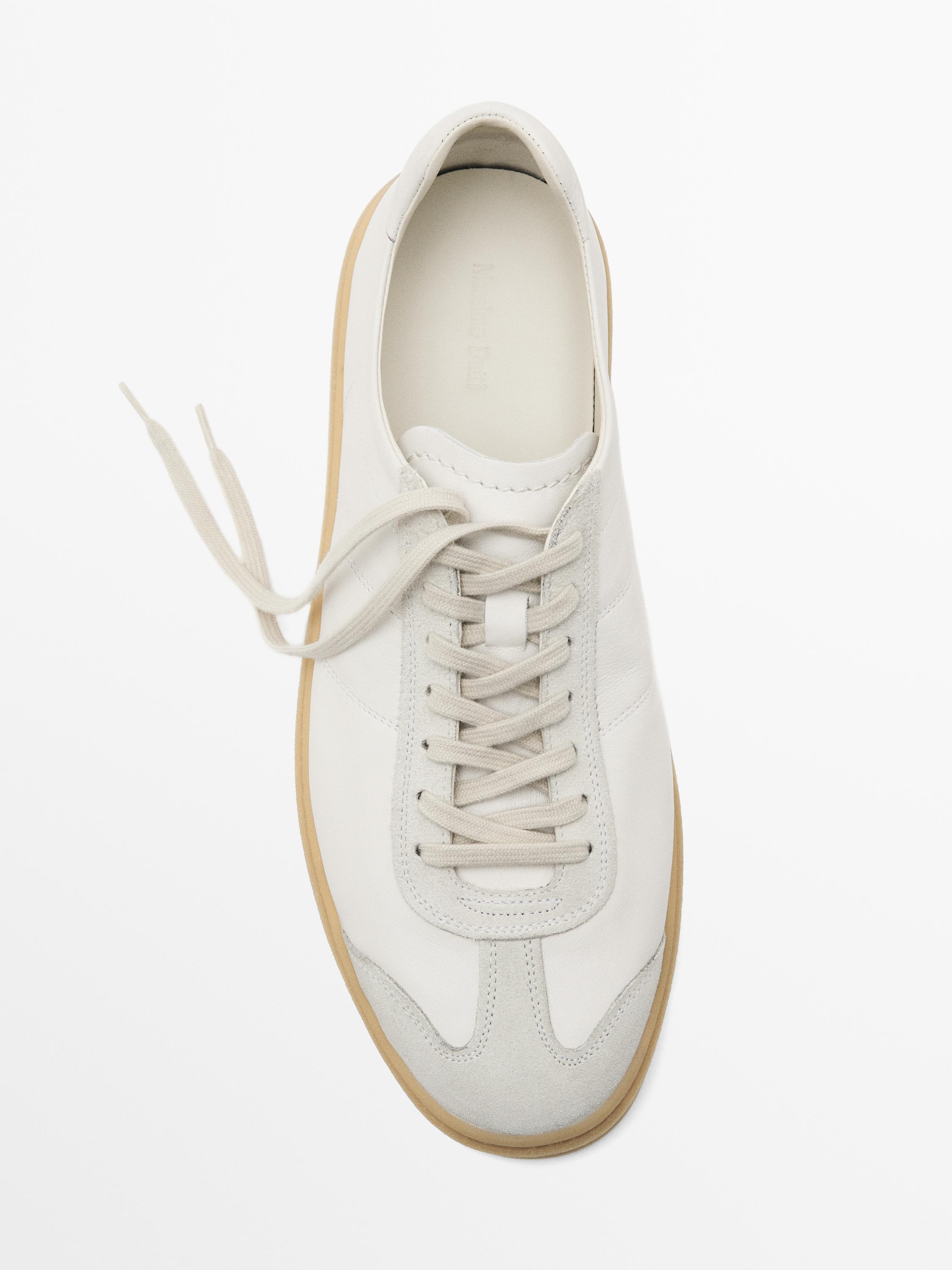 Tennis cuir contrastant
