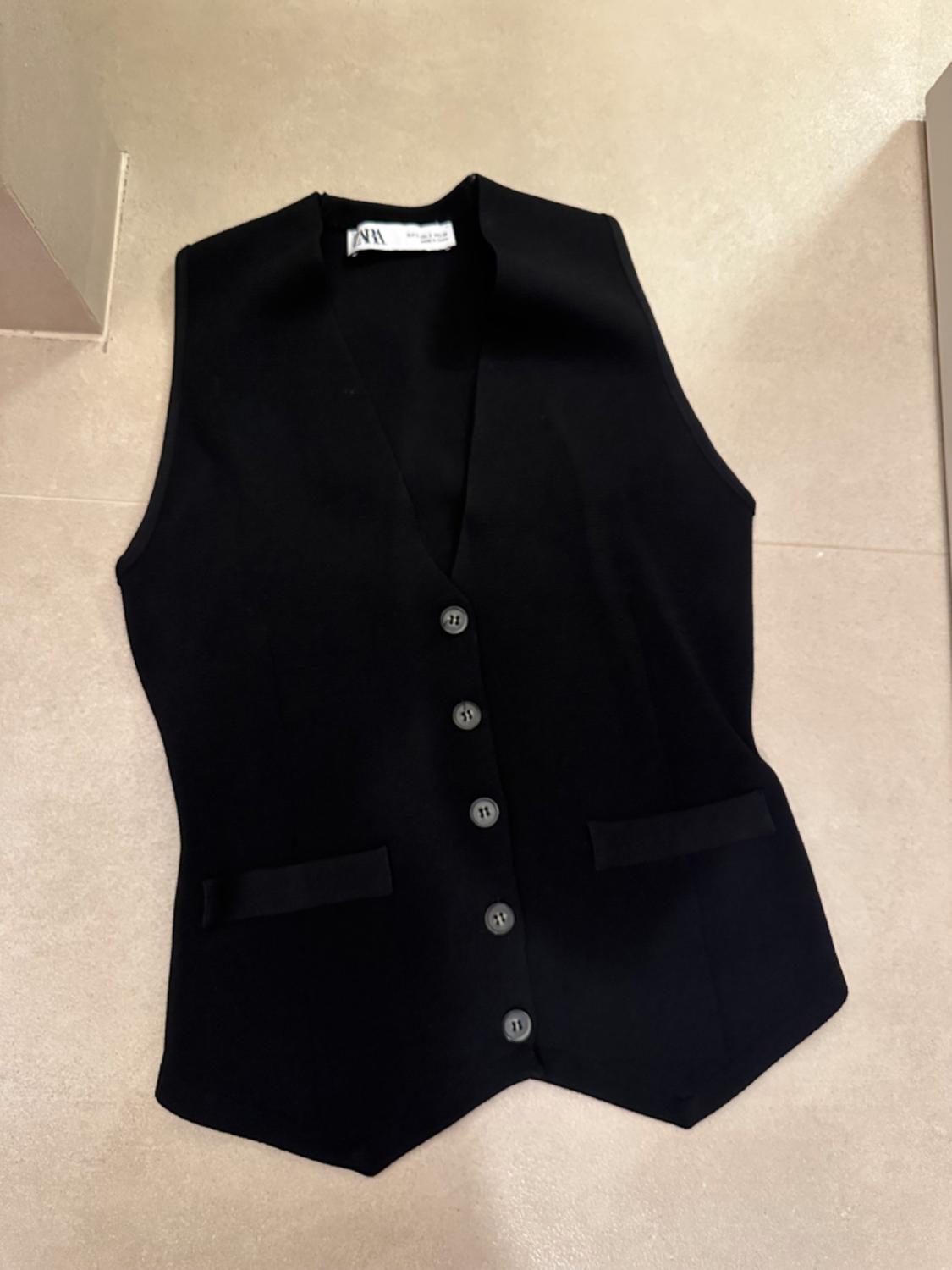 KNITTED WAISTCOAT