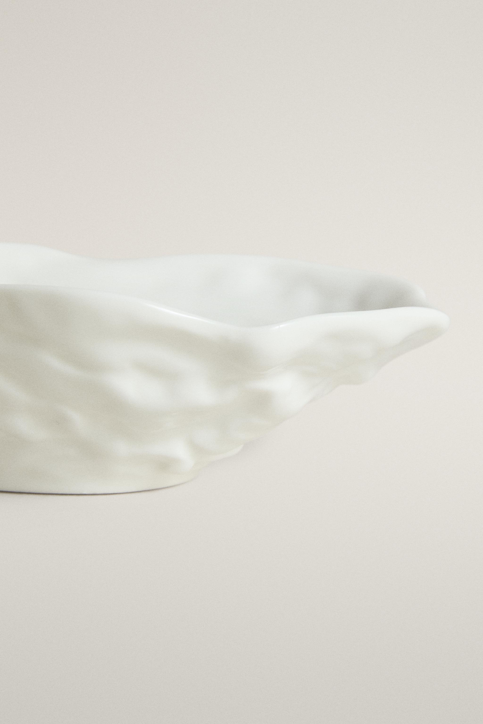 PETIT PLAT EN PORCELAINE COQUILLAGE