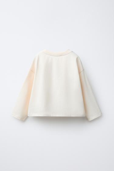 T-SHIRT À IMPRIMÉ FLOQUÉ NAON JEONG © - Écru de Zara - Image 1