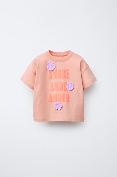 CAMISETA TEXTO APLIQUE FLORES - Rosa claro de Zara