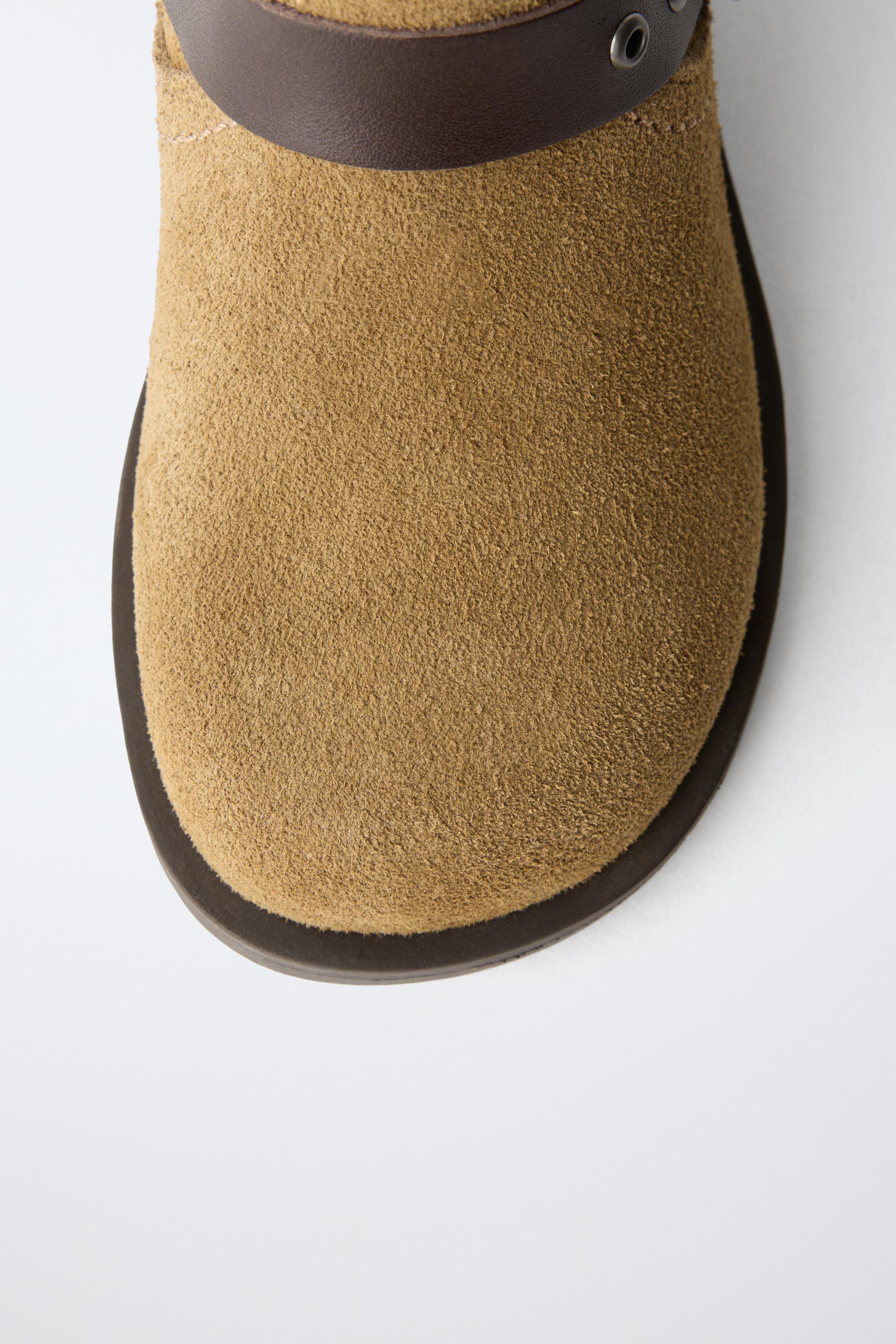 BOTTINES EN CUIR À DOUBLE BOUCLE