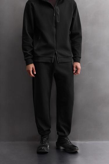 TECHNICAL ZIP TROUSERS - Black by Zara