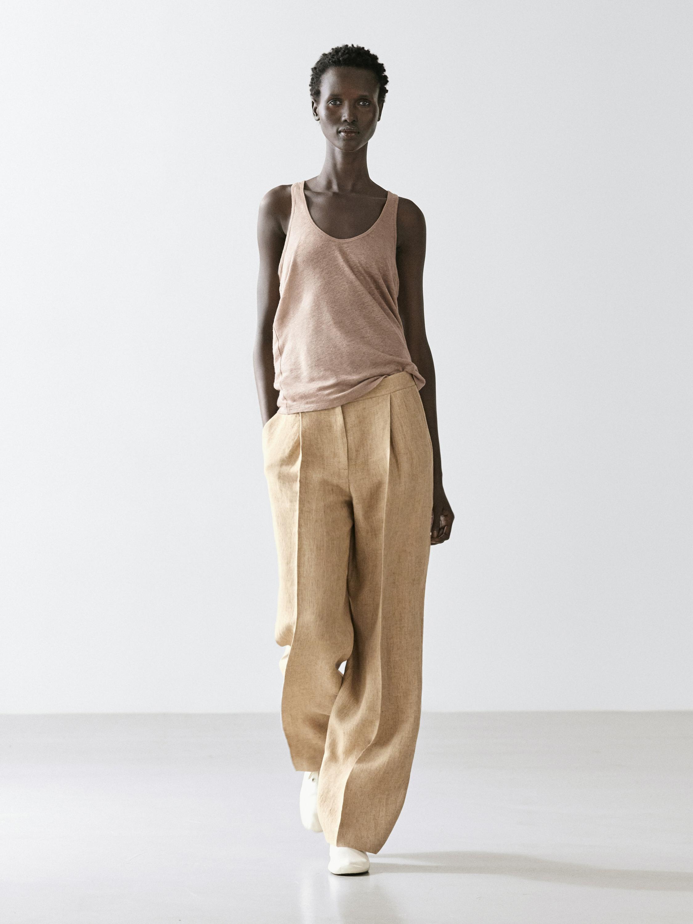 Flowing linen trousers with darts — Beige