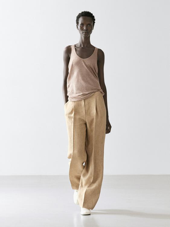 Flowing linen trousers with darts from Zara - $130