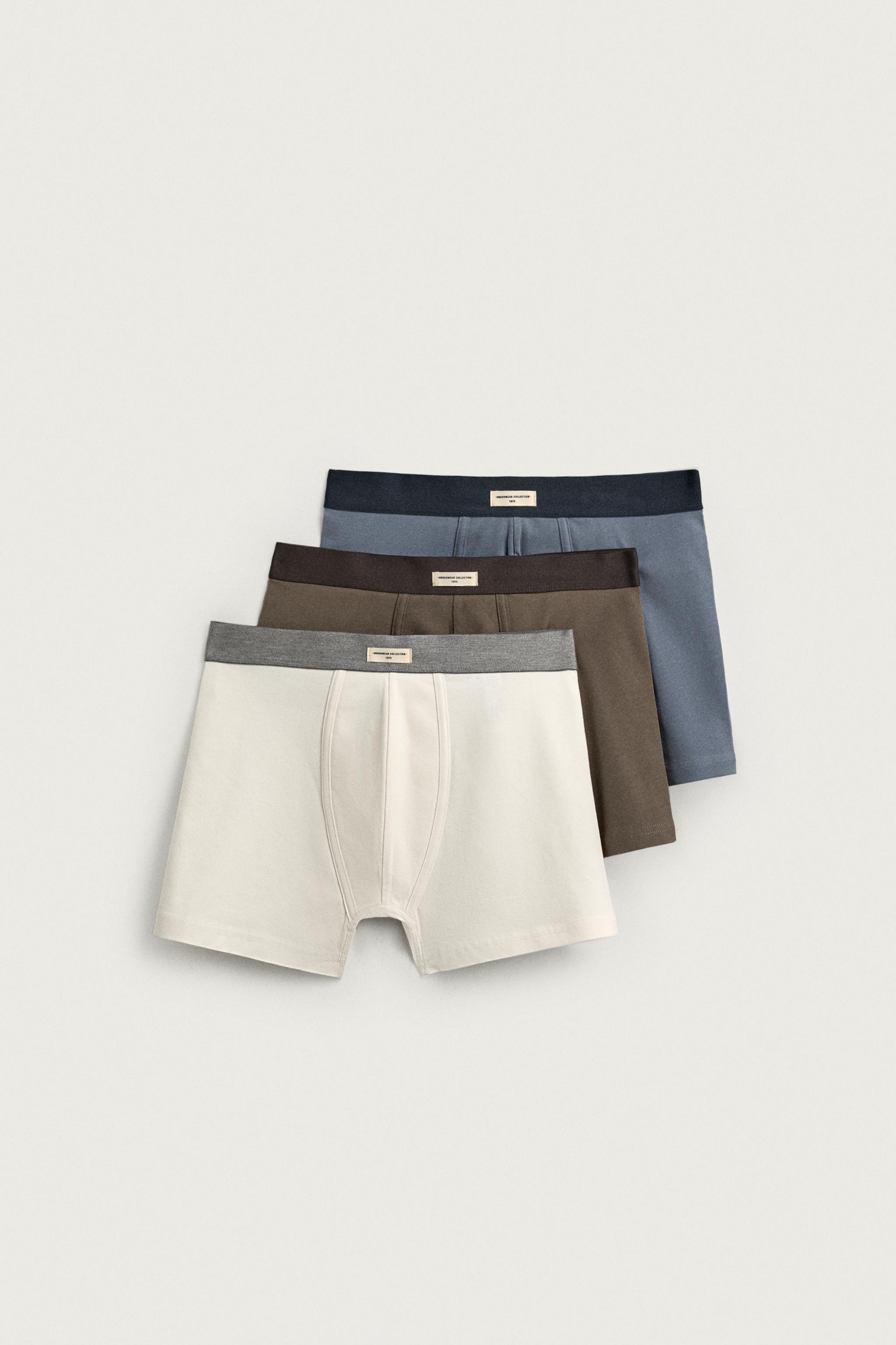 THREE-PACK OF ASSORTED BOXERS — various