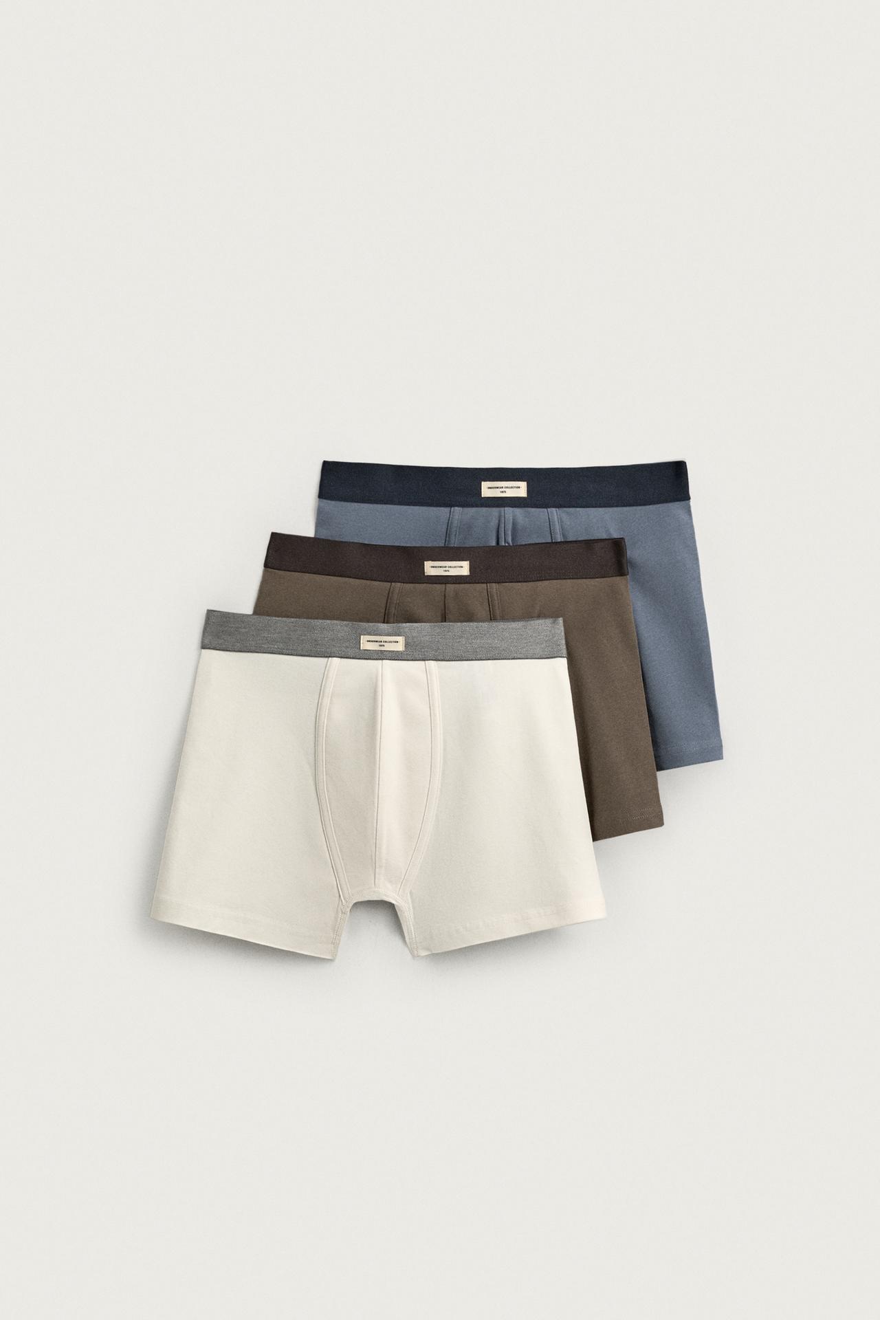 THREE-PACK OF ASSORTED BOXERS — various