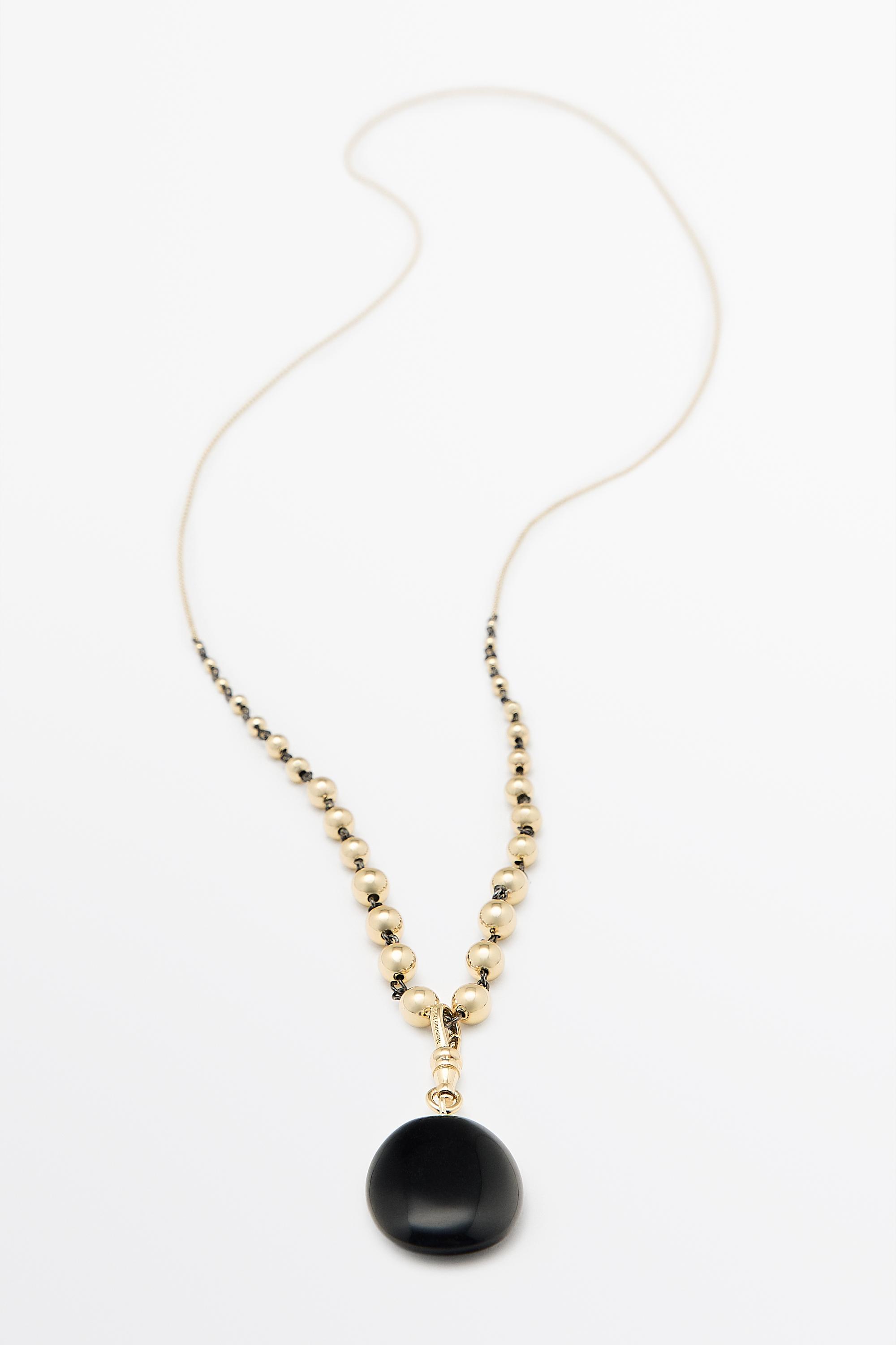 Collier chaîne à billes et onyx