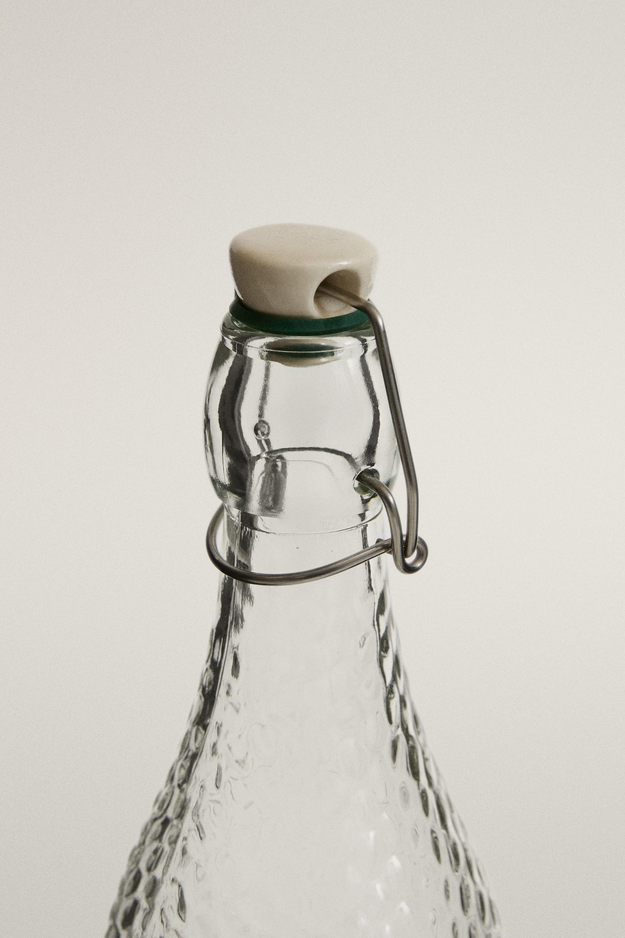 BOTTLE WITH CERAMIC STOPPER — Transparent