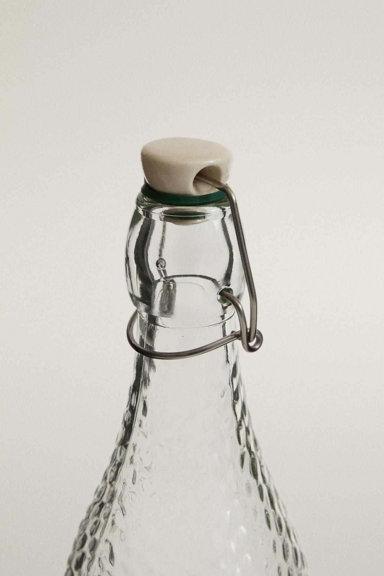 BOTTLE WITH CERAMIC STOPPER — Transparent