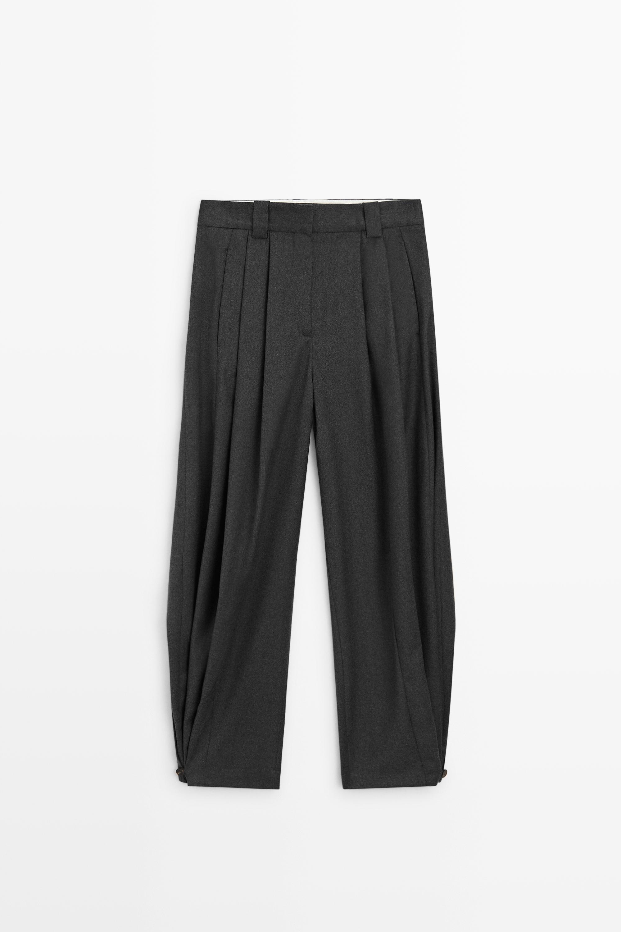Pantalon flanelle à plis et détail bas