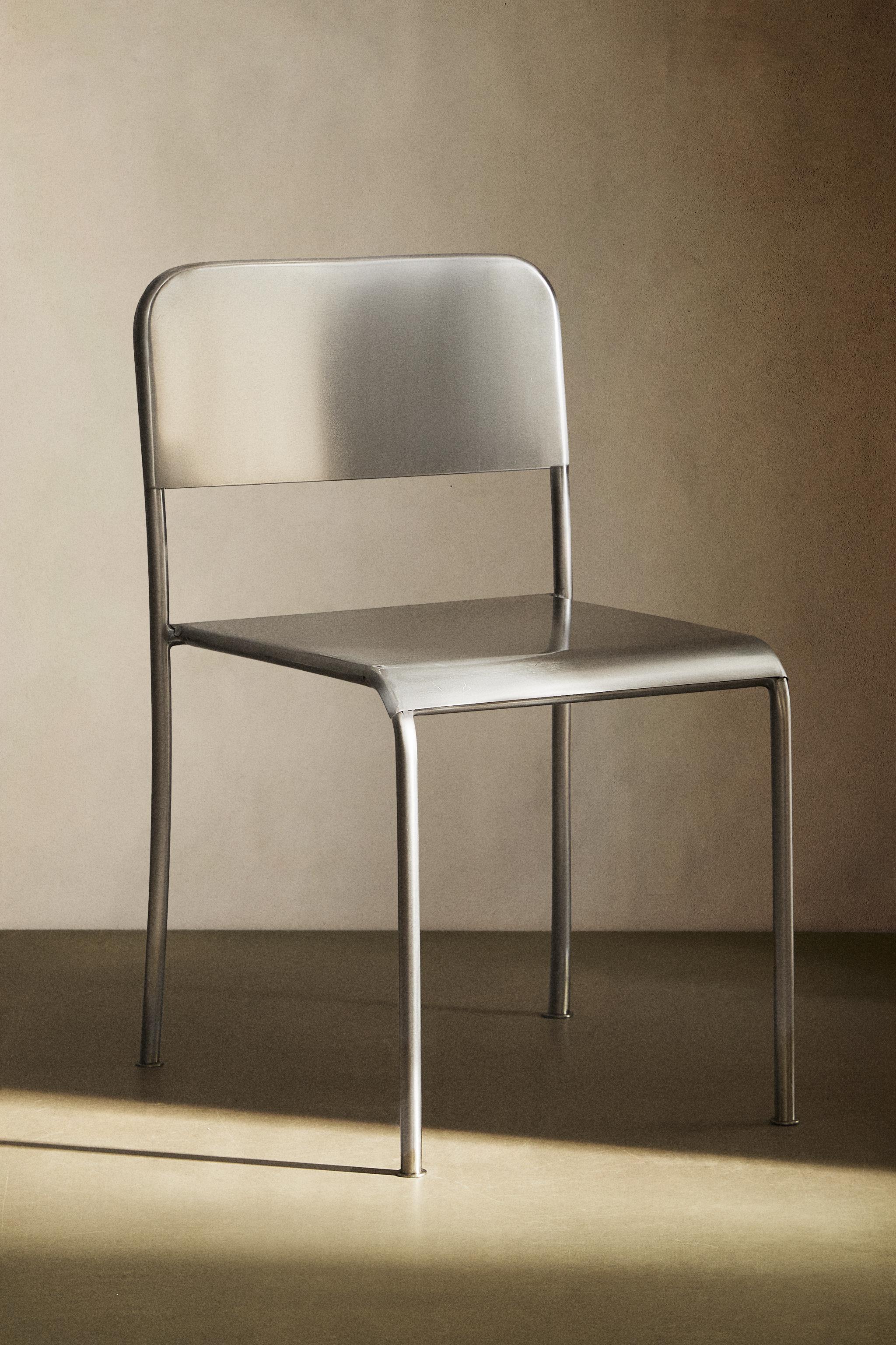 CHAISE STRUCTURE ACIER INOXYDABLE