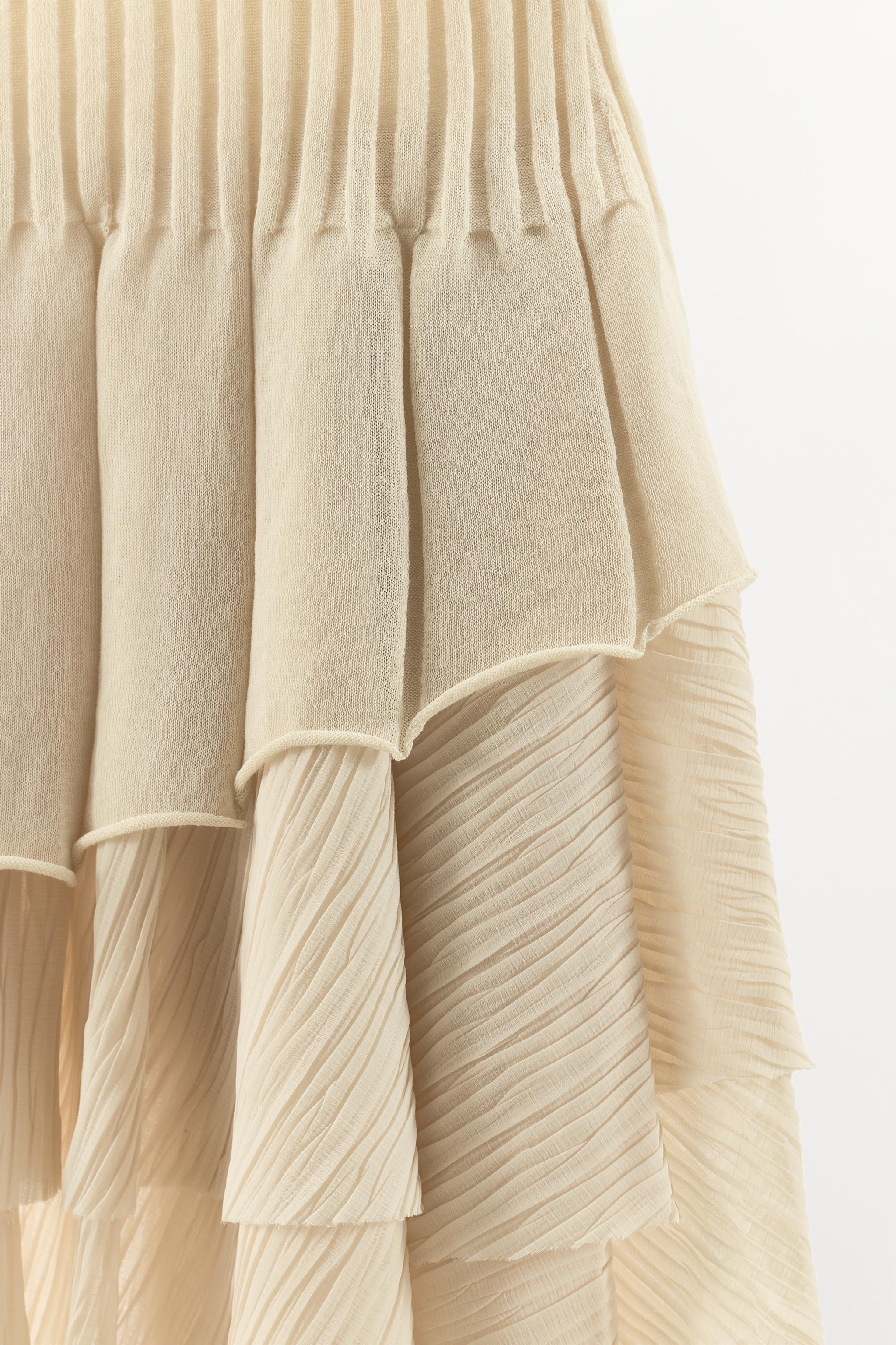 COMBINED ASYMMETRIC KNIT SKIRT