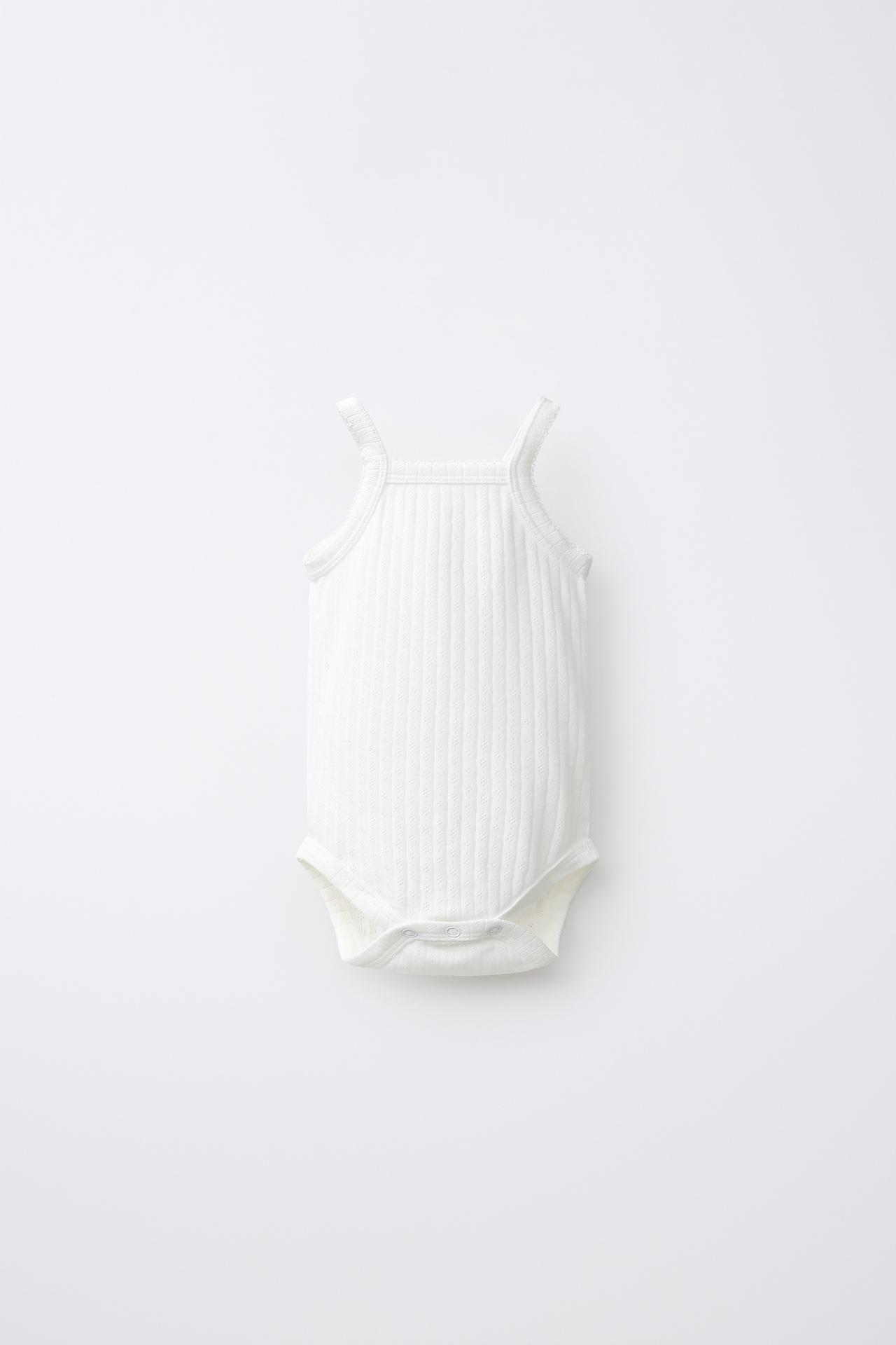 THREE-PACK OF POINTELLE STRAP BODYSUITS — Ecru