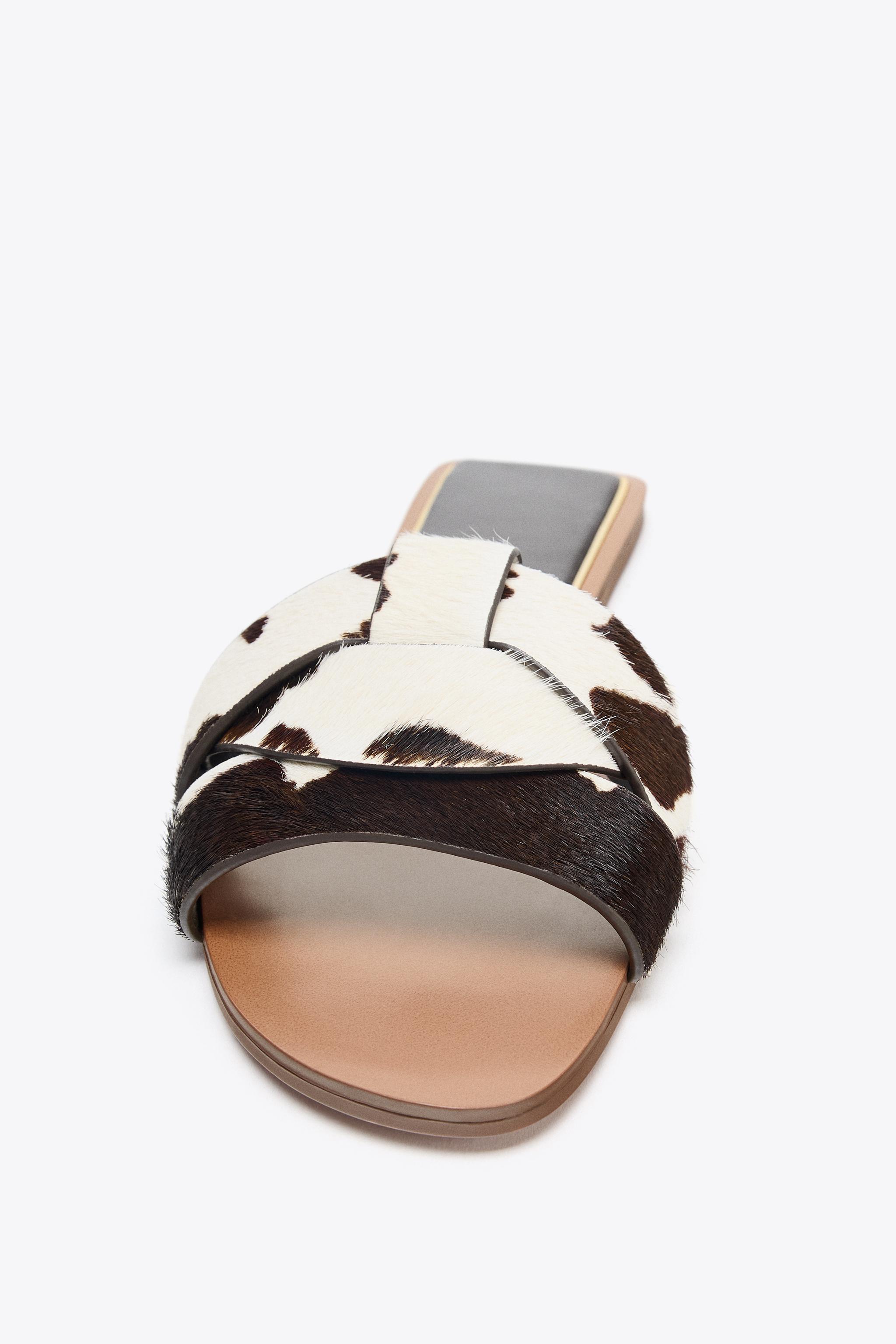 SANDALES PLATES EN CUIR