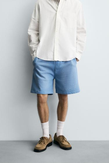 Zara SPRAY WASH SHORTS - Light blue