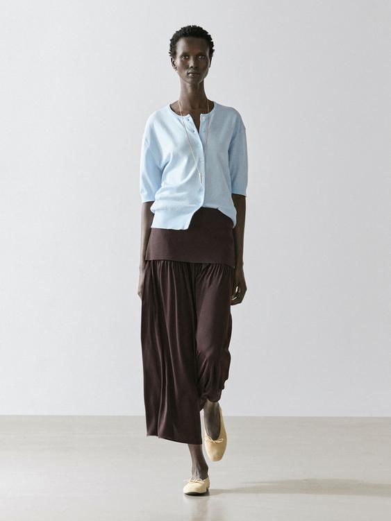 Flowing contrast midi skirt from Zara - $160