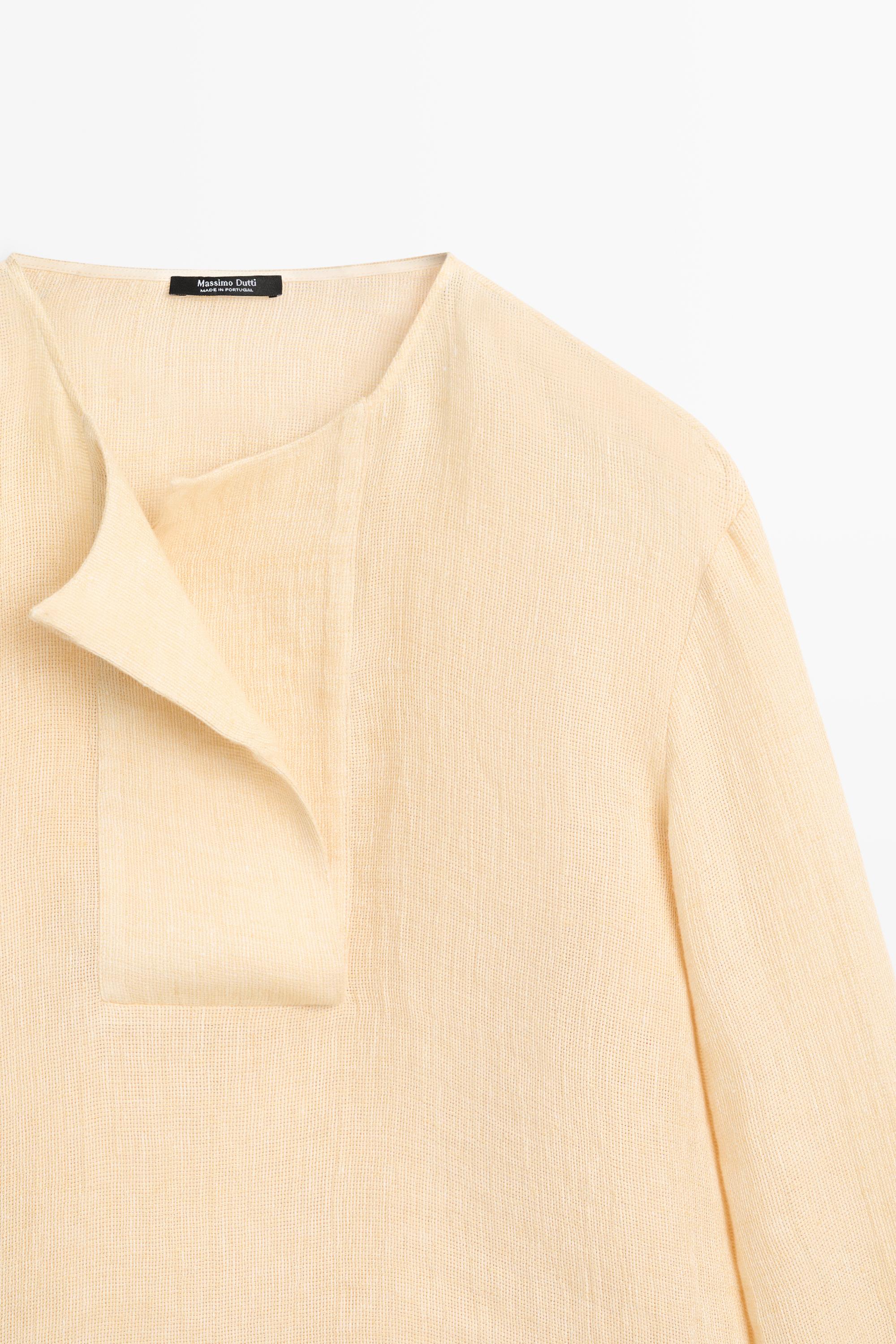 Flowing linen blouse with chest detail
