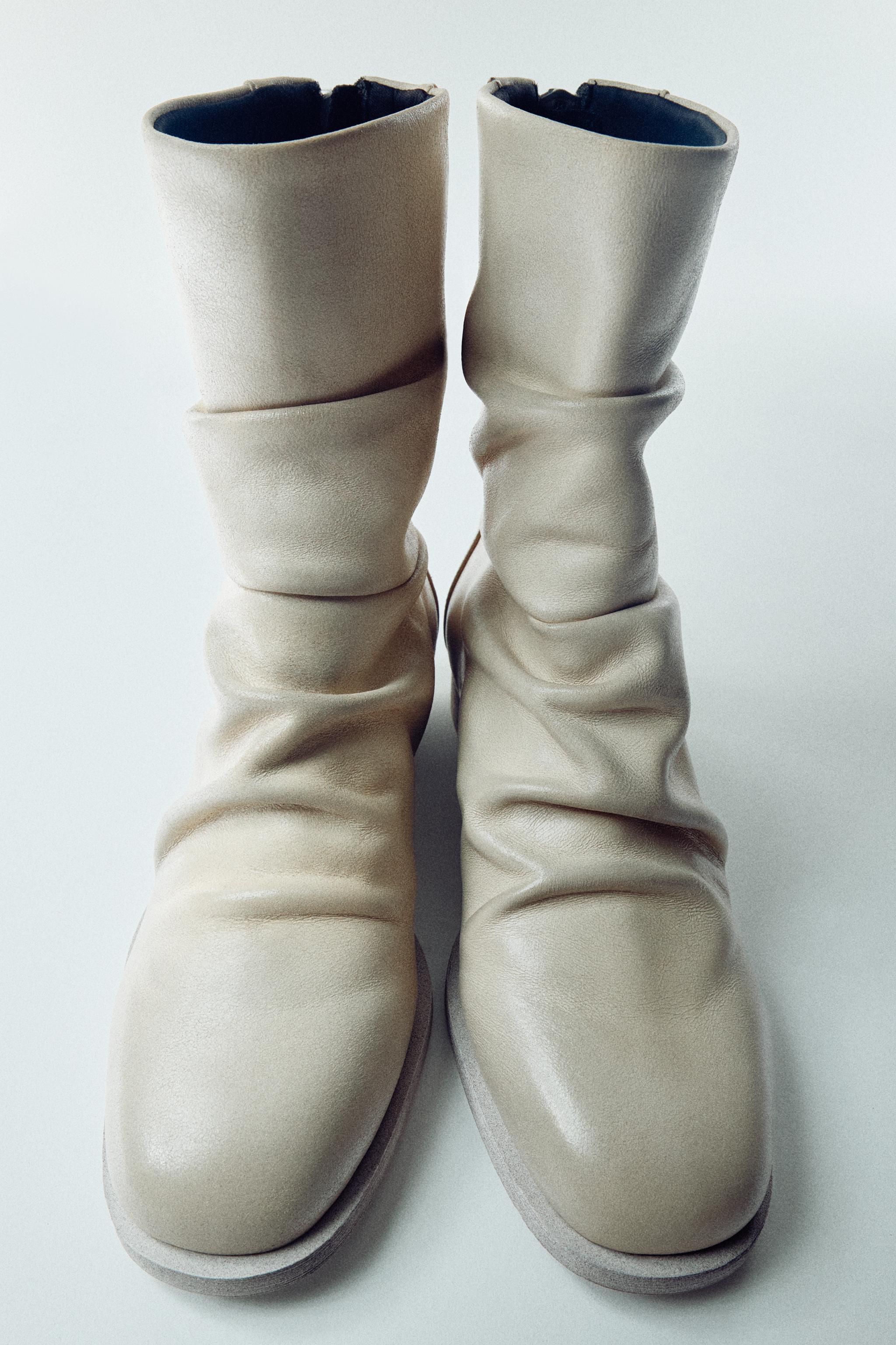 PLEATED LEATHER FLAT ANKLE BOOTS
