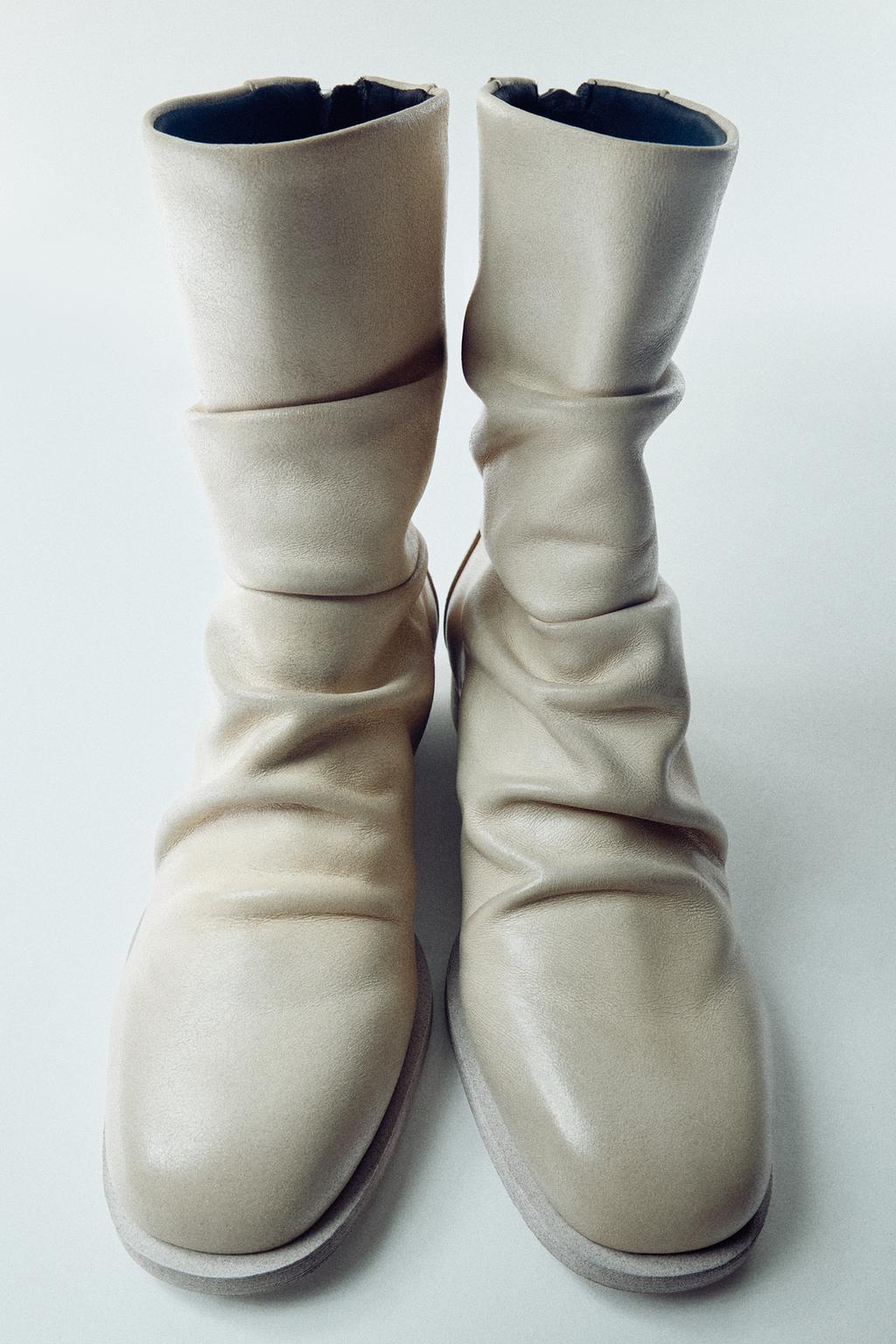 PLEATED LEATHER FLAT ANKLE BOOTS