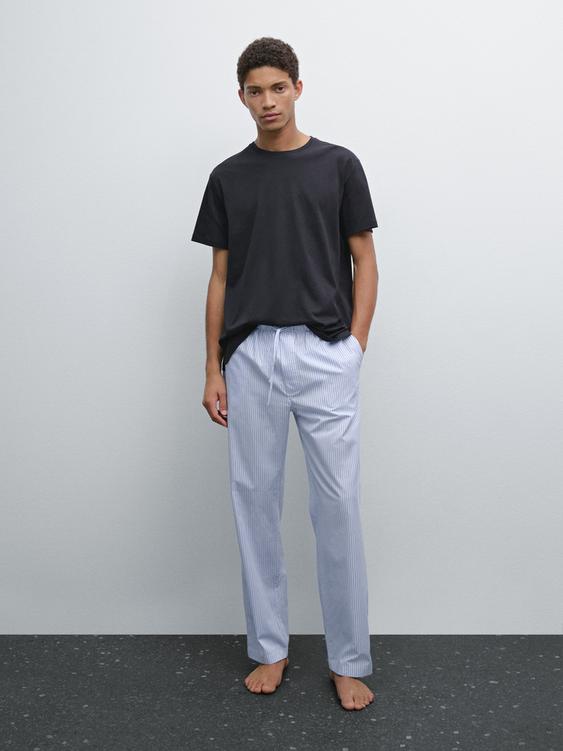 Short sleeve pyjama top and striped trousers