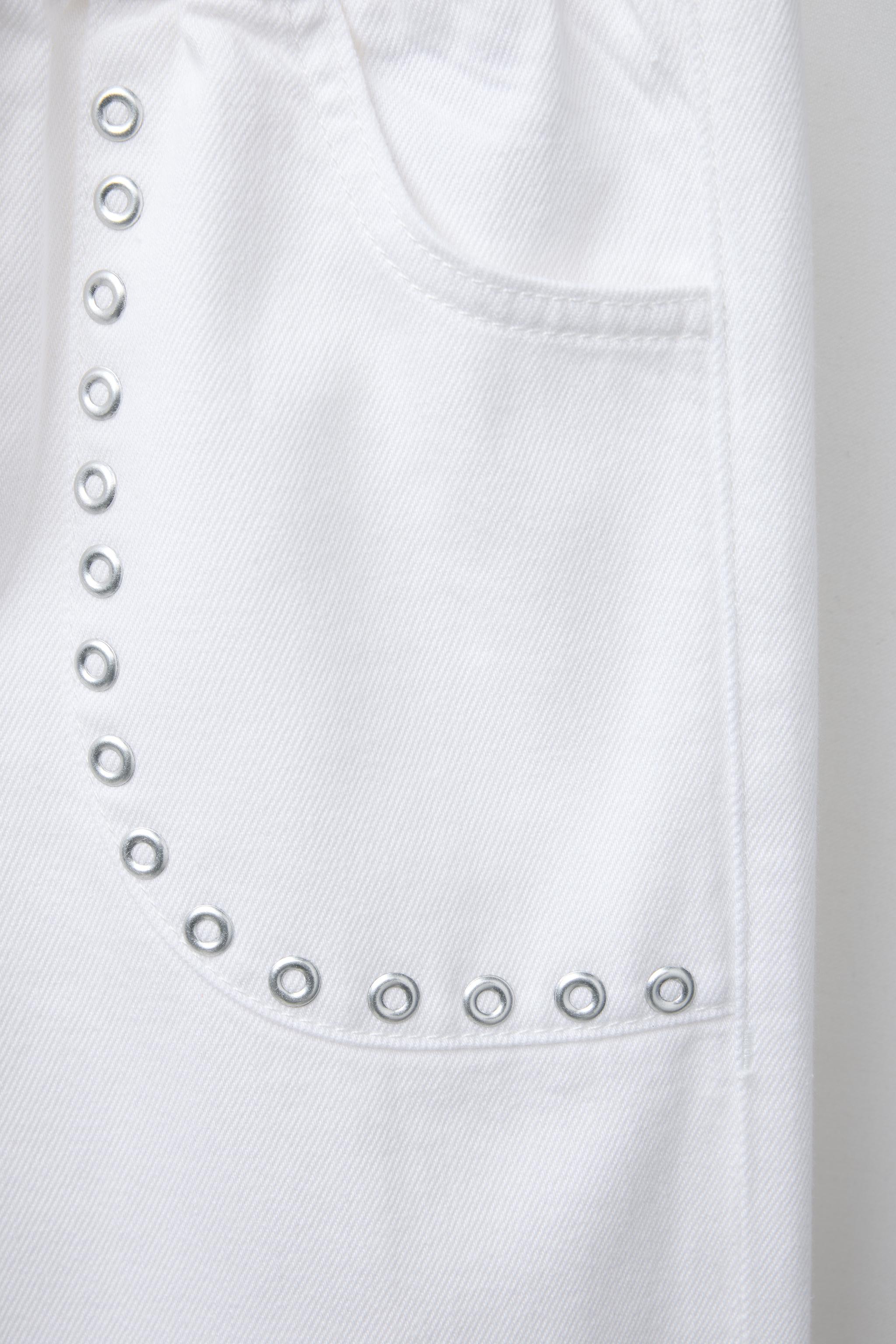 STUDDED FLOWY WIDE LEG JEANS