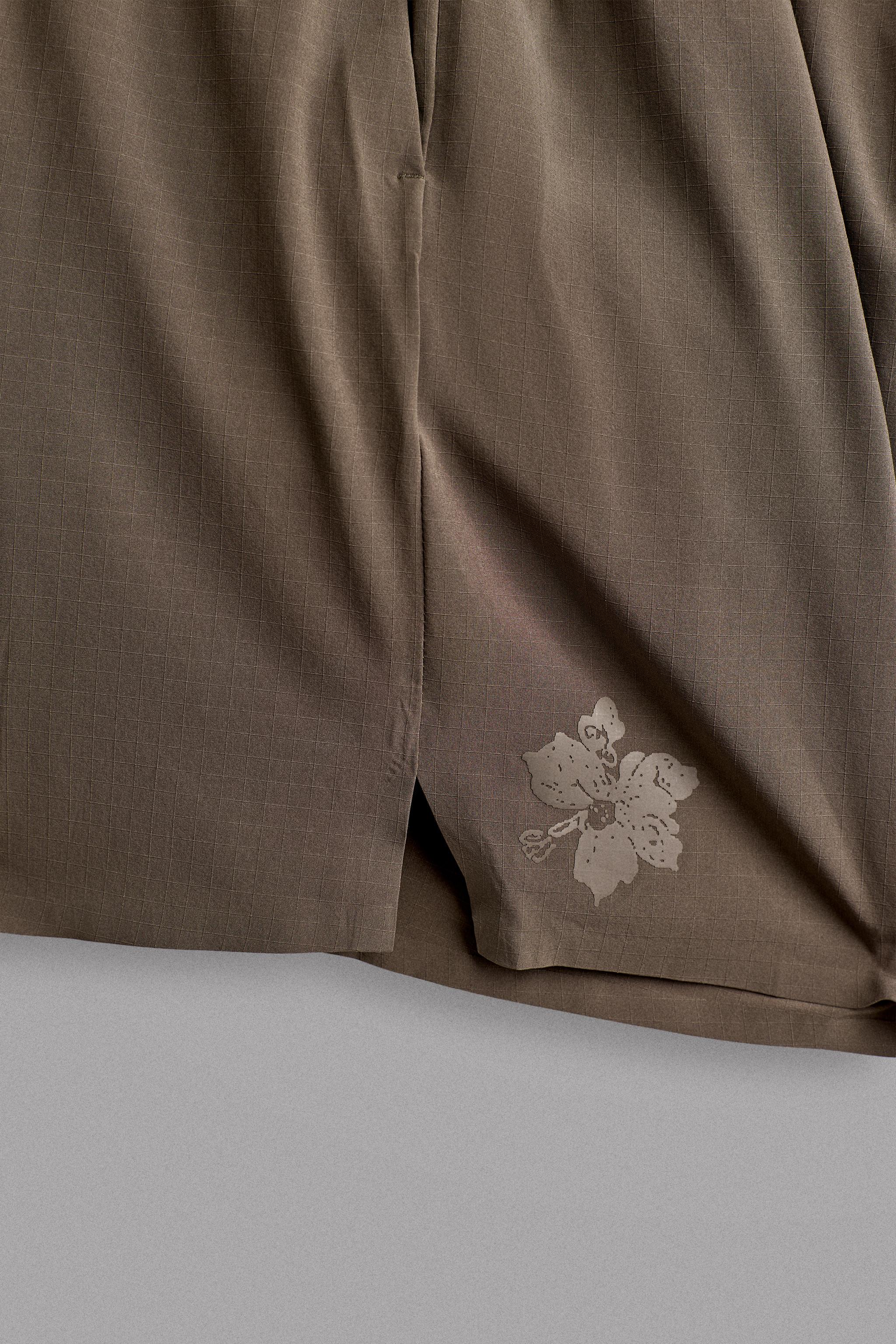 9" TRAINING SHORTS
