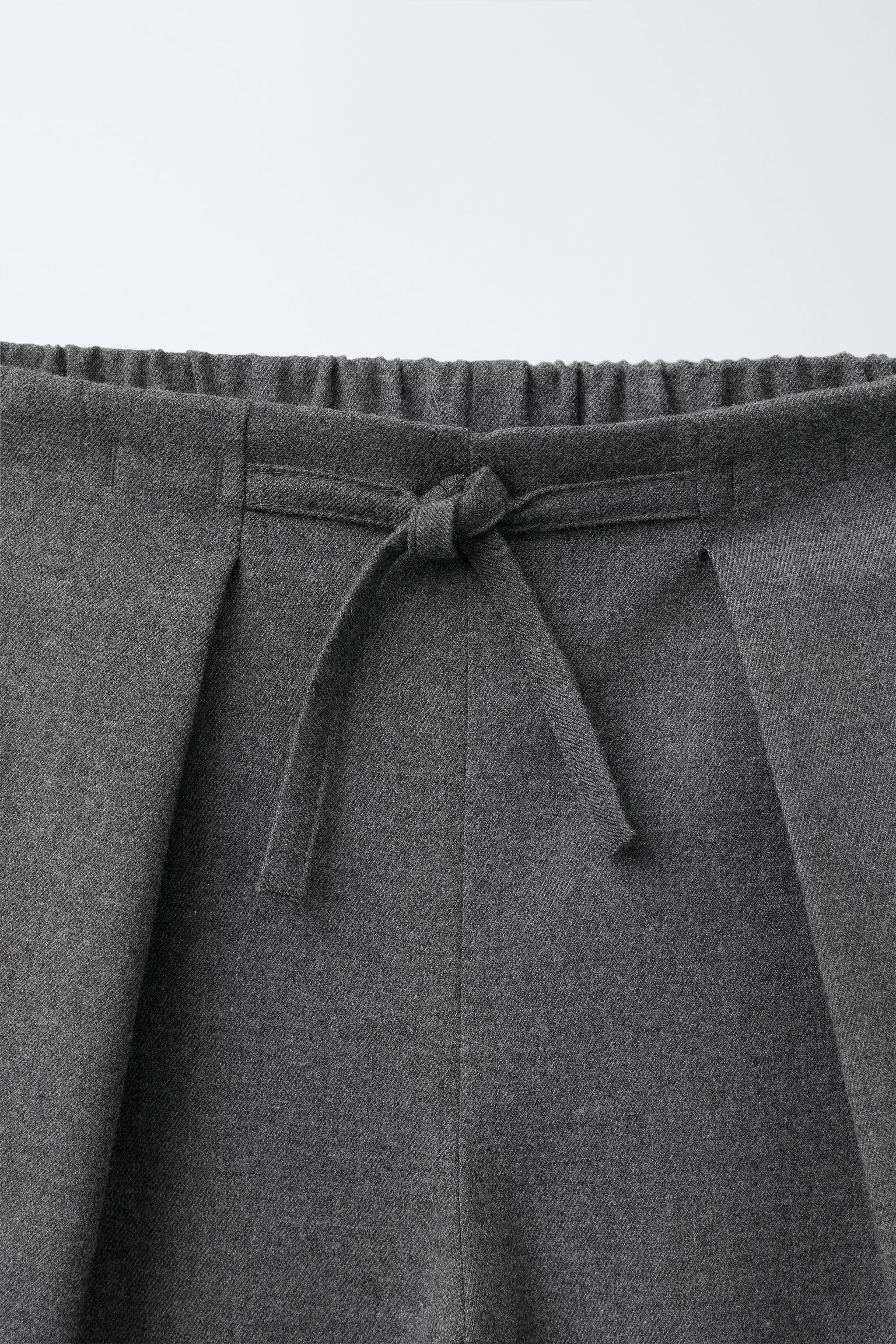 PLEATED SUIT PANTS