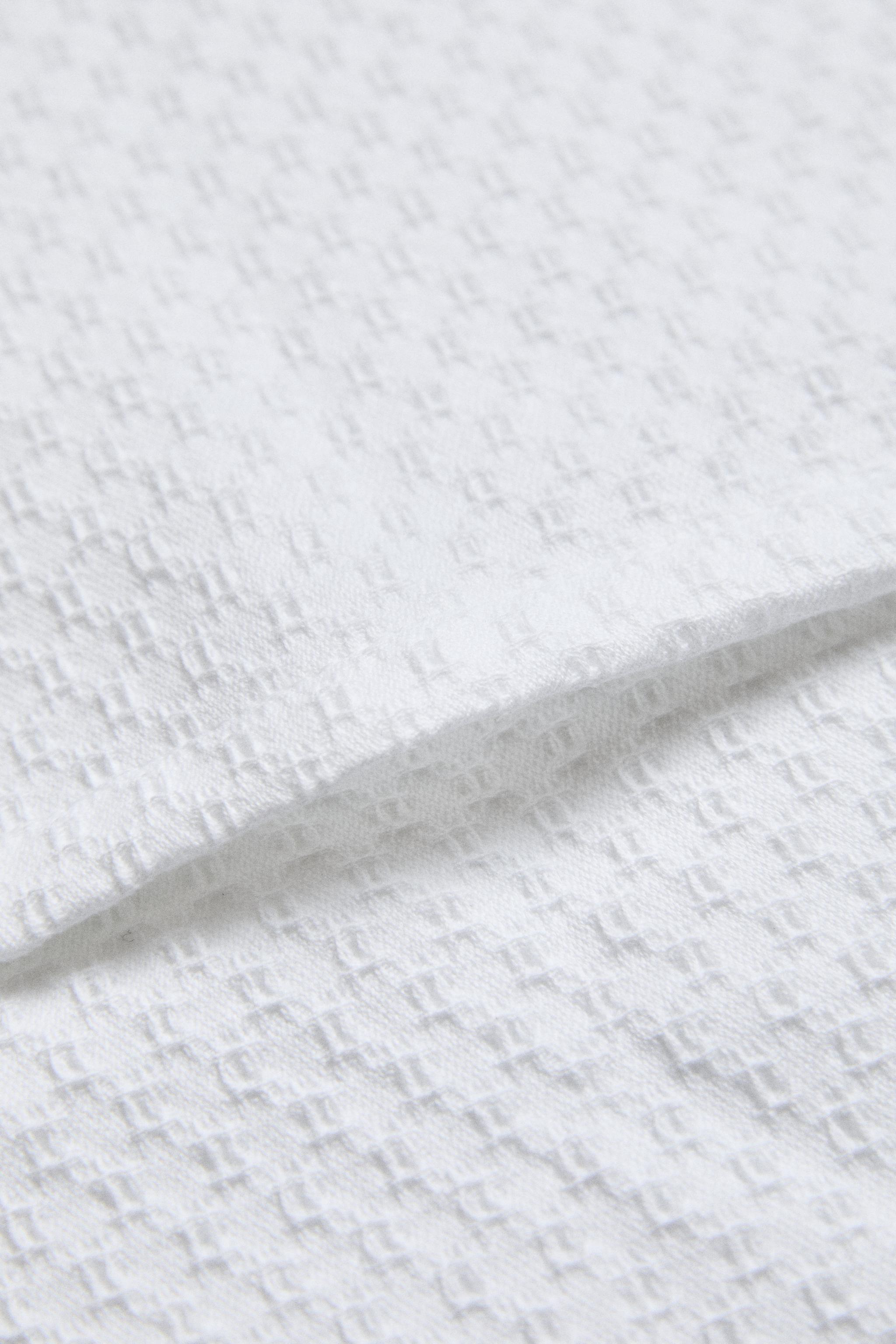 EMBOSSED THROW PILLOW COVER